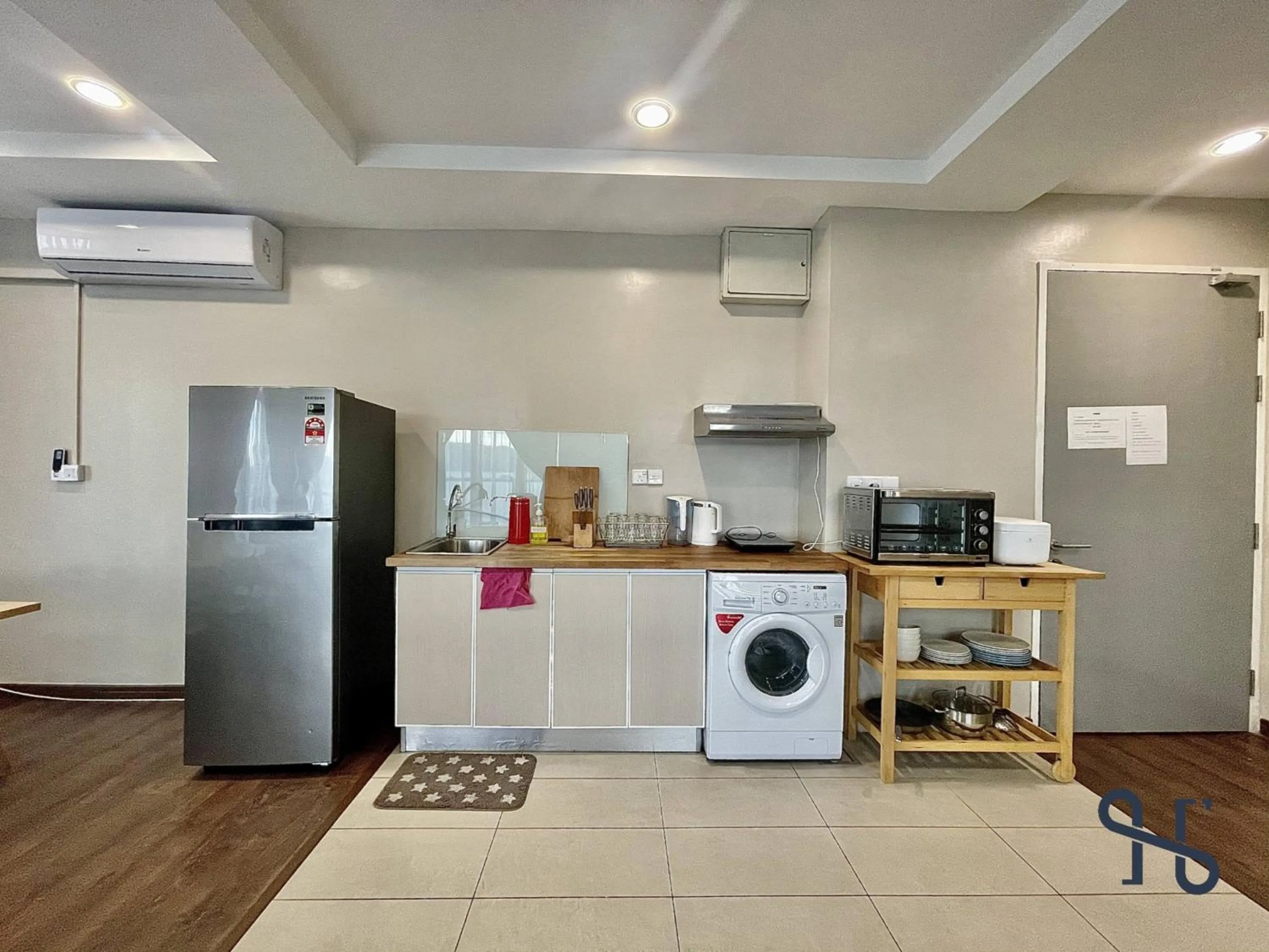 Kitchen or kitchenette in Homesuite' Home at Riverson Soho