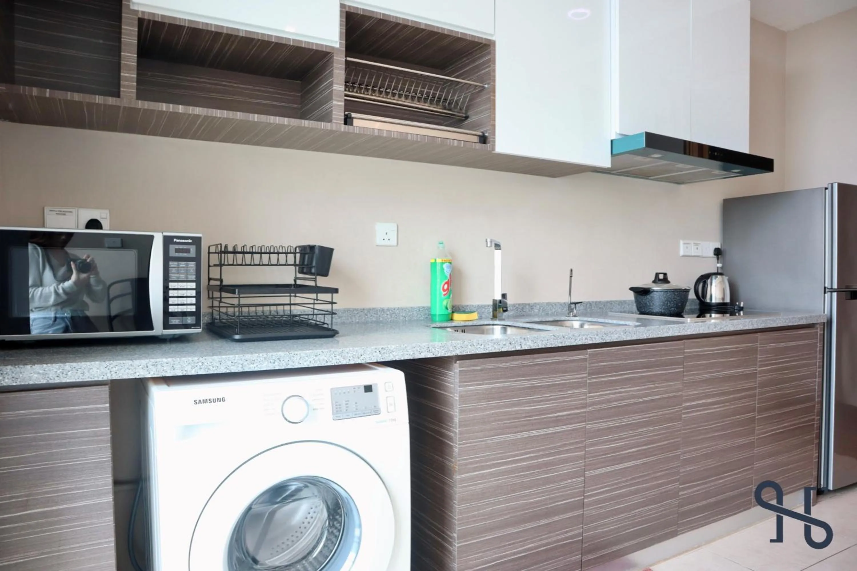 Kitchen or kitchenette in Homesuite' Home at Riverson Soho