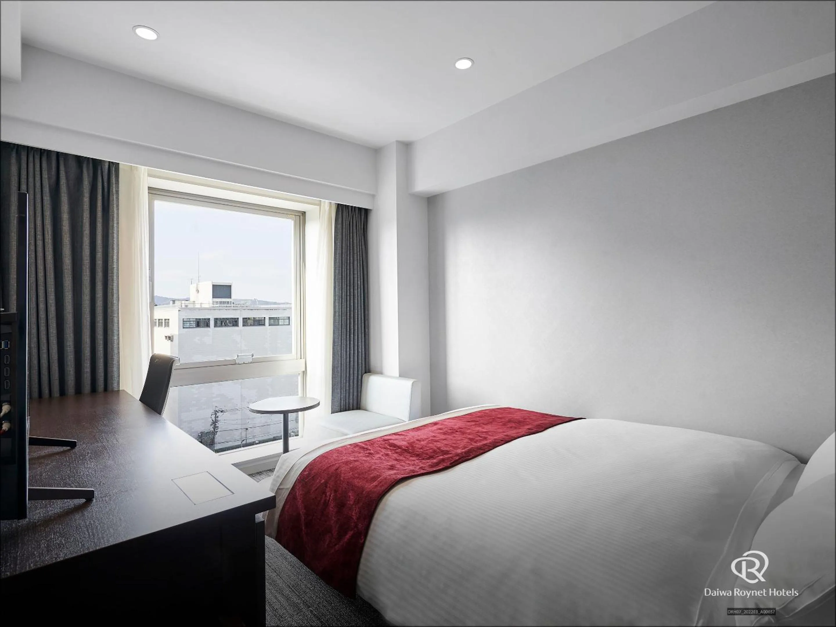 Bed in Daiwa Roynet Hotel Kumamoto