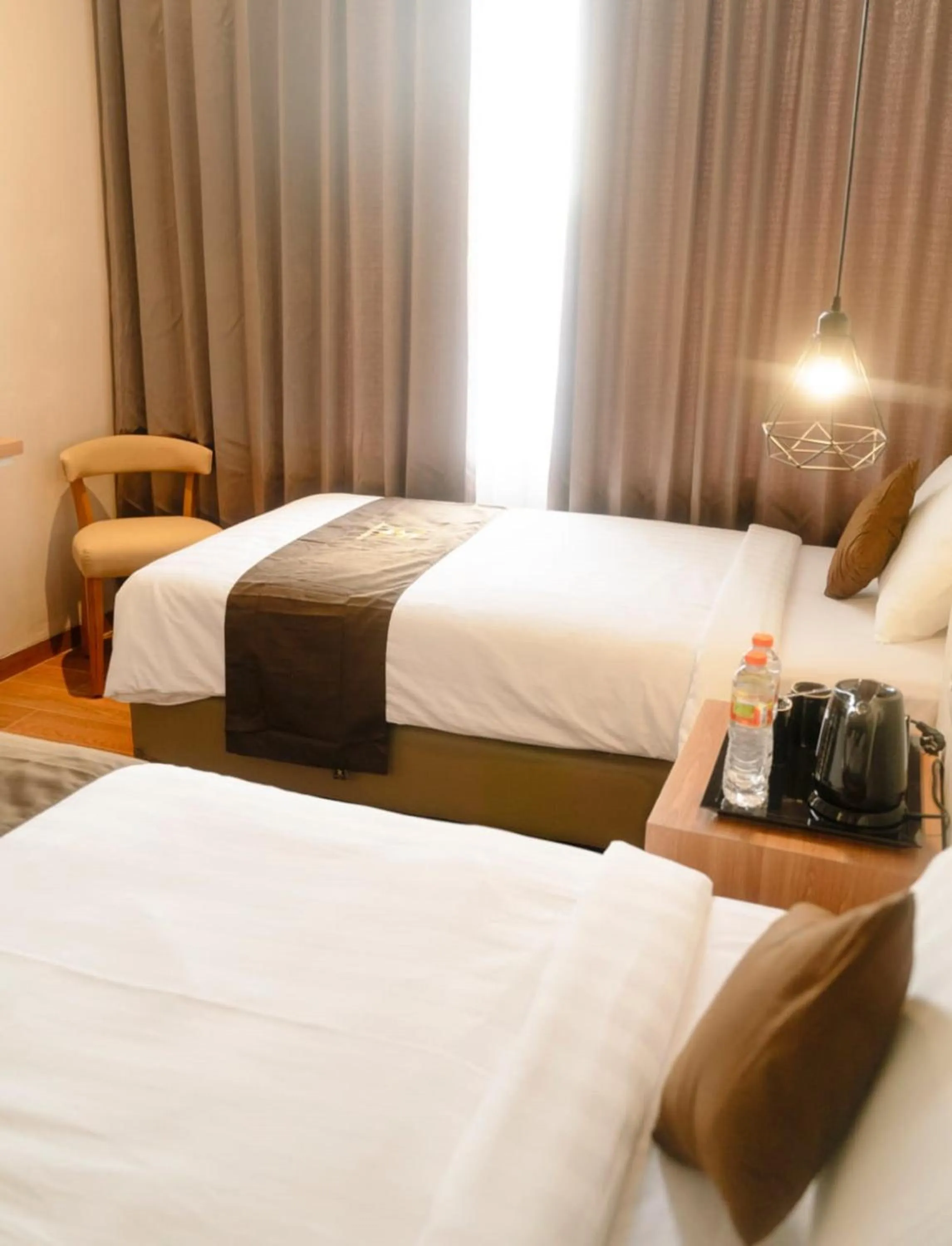 Bed in Zenith Premiere Hotel Baubau