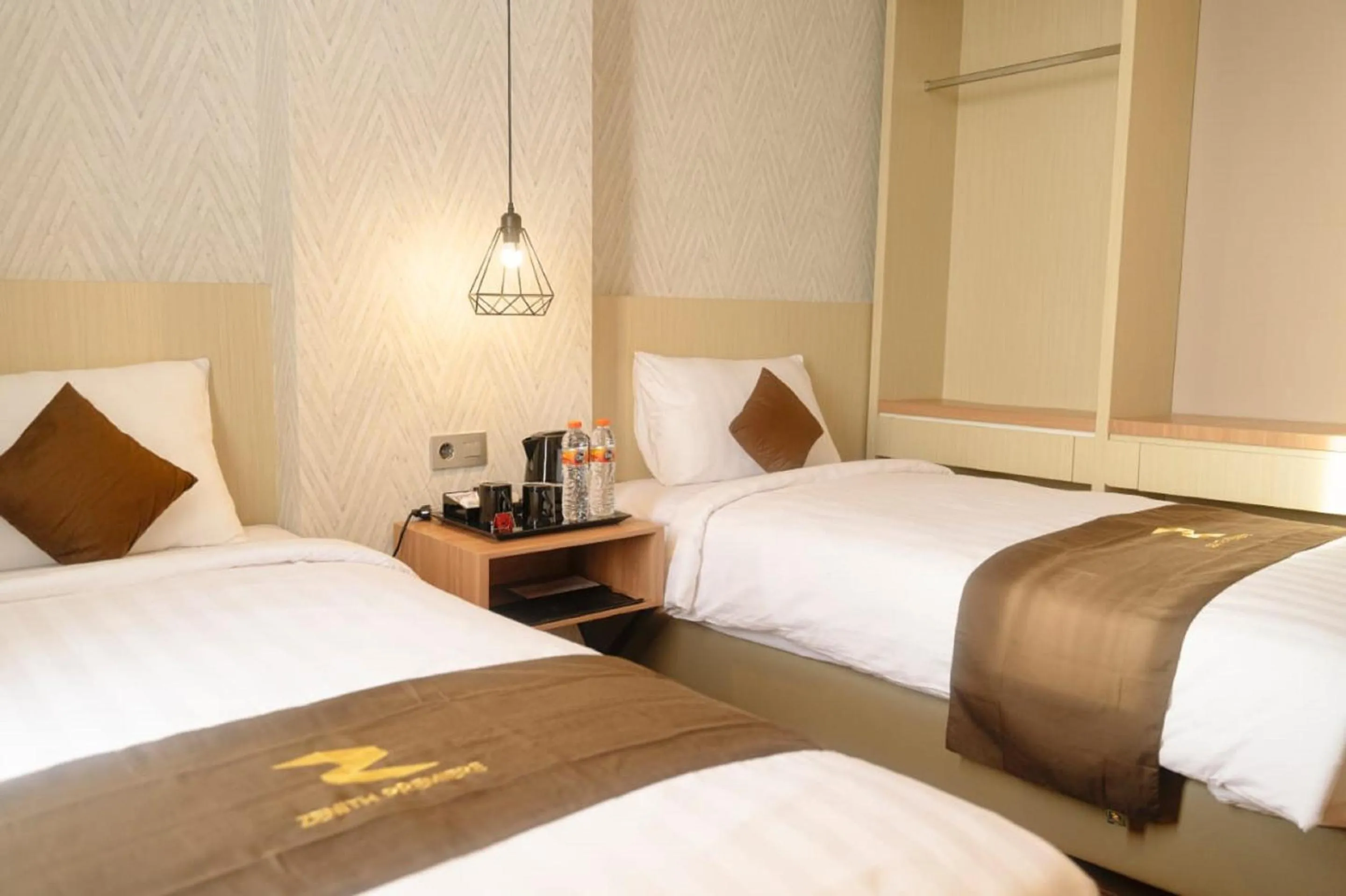 Bed in Zenith Premiere Hotel Baubau