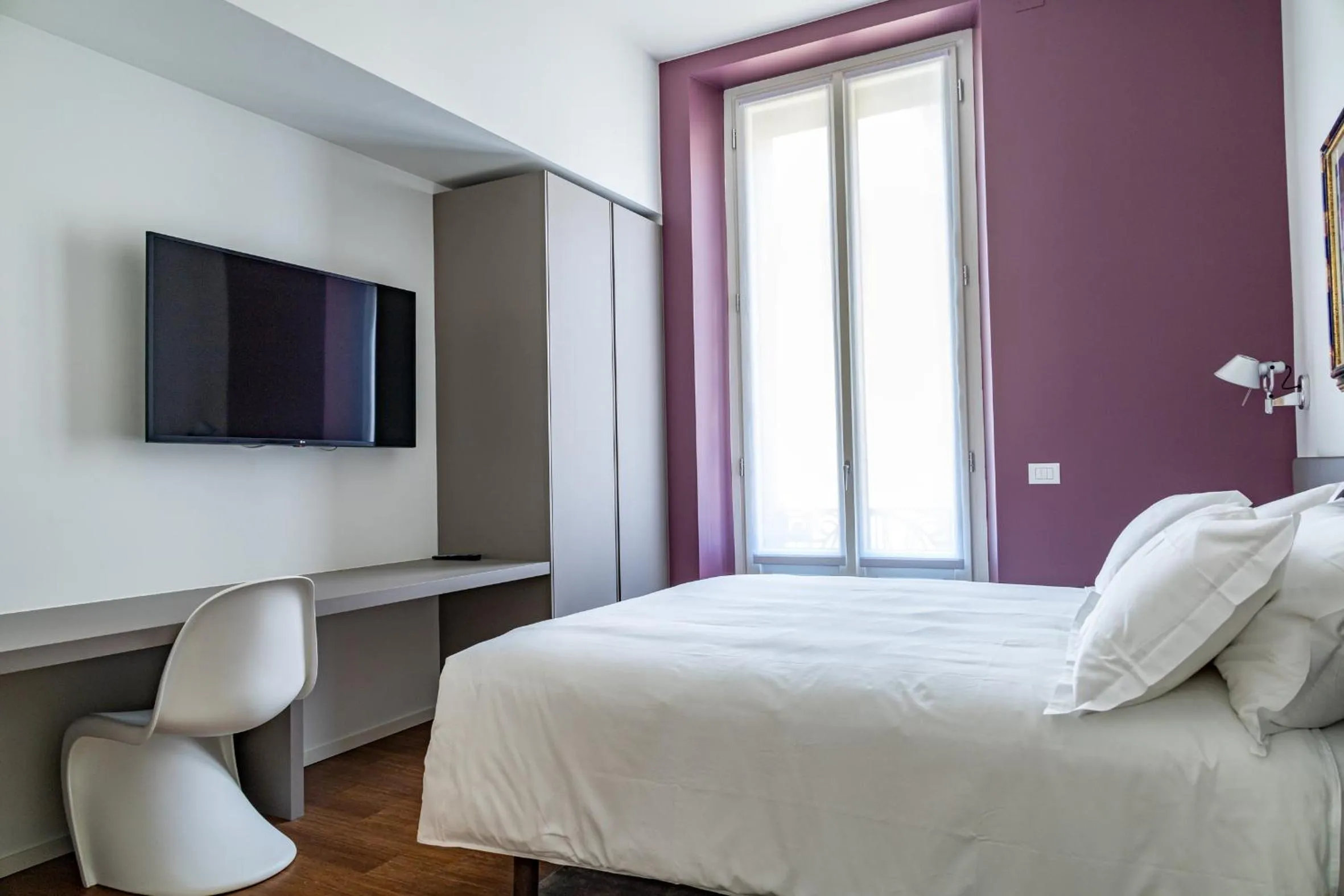 Bedroom in Ariosto Social Club