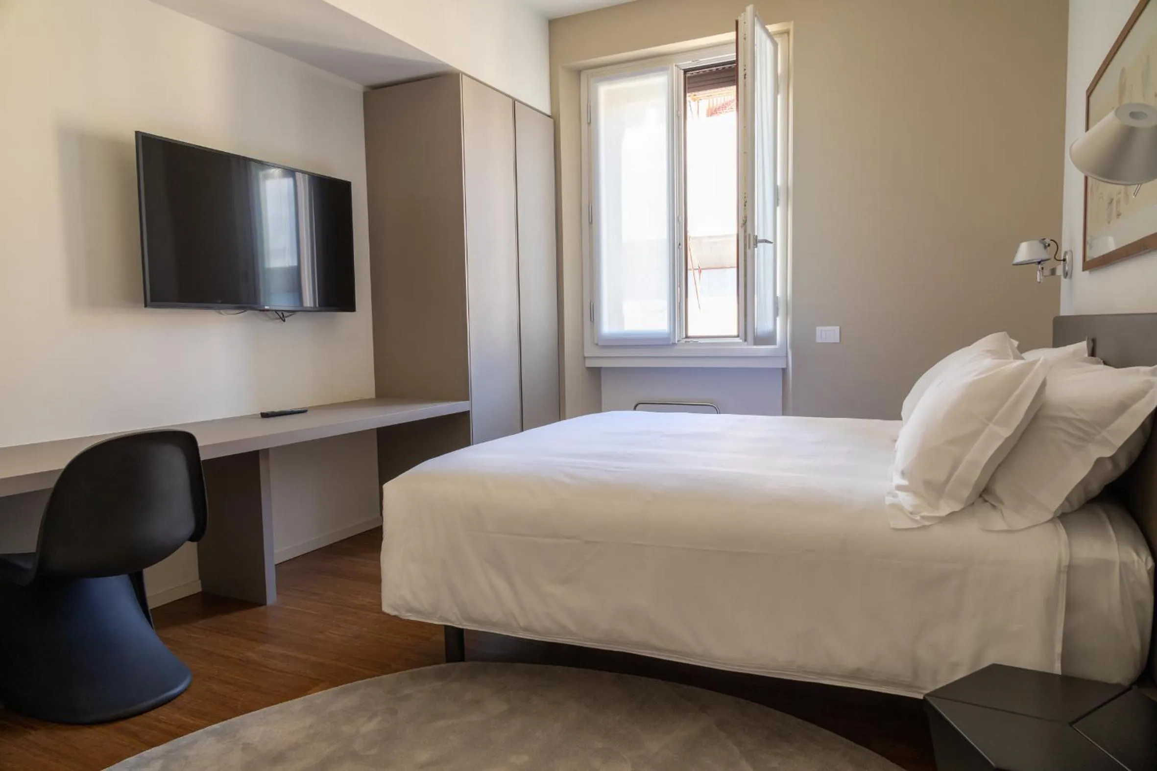 Bedroom in Ariosto Social Club