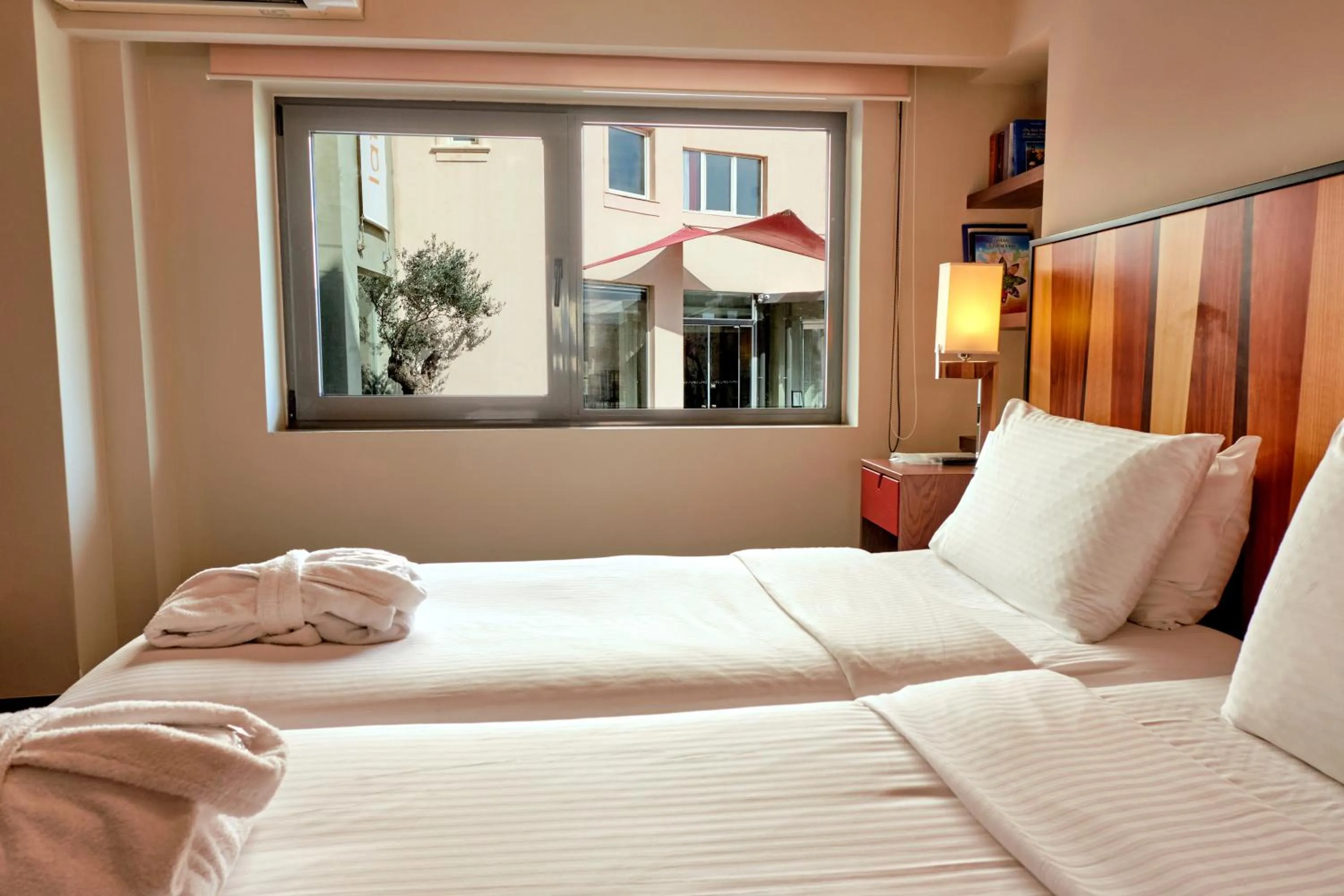 Bed in Lato Annex Boutique Rooms