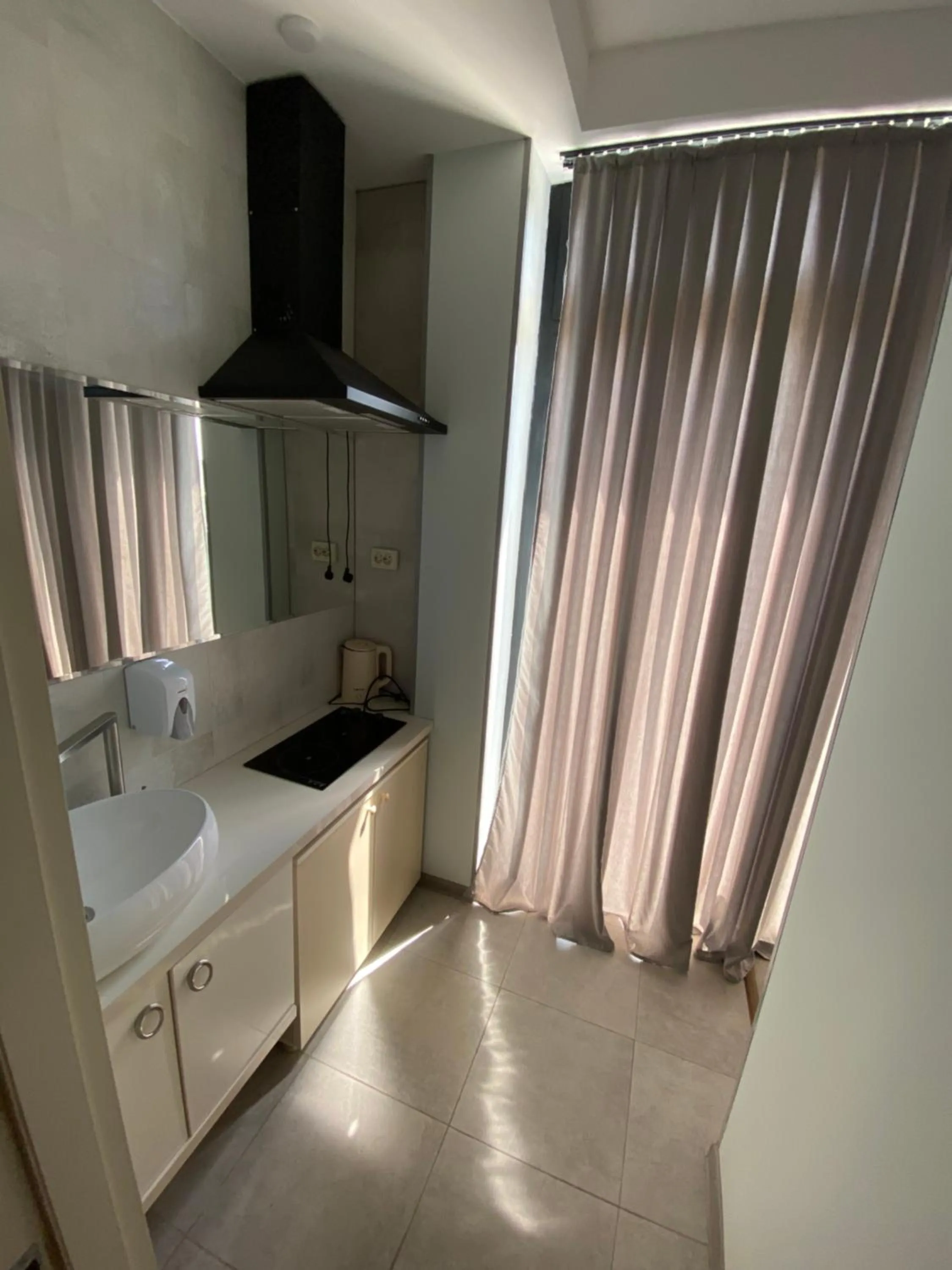Kitchen or kitchenette, Bed in Hotel Rustaveli