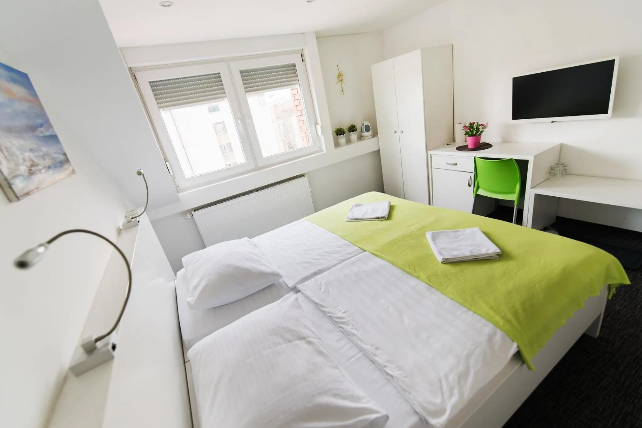 Bedroom in Tia Apartments and Rooms