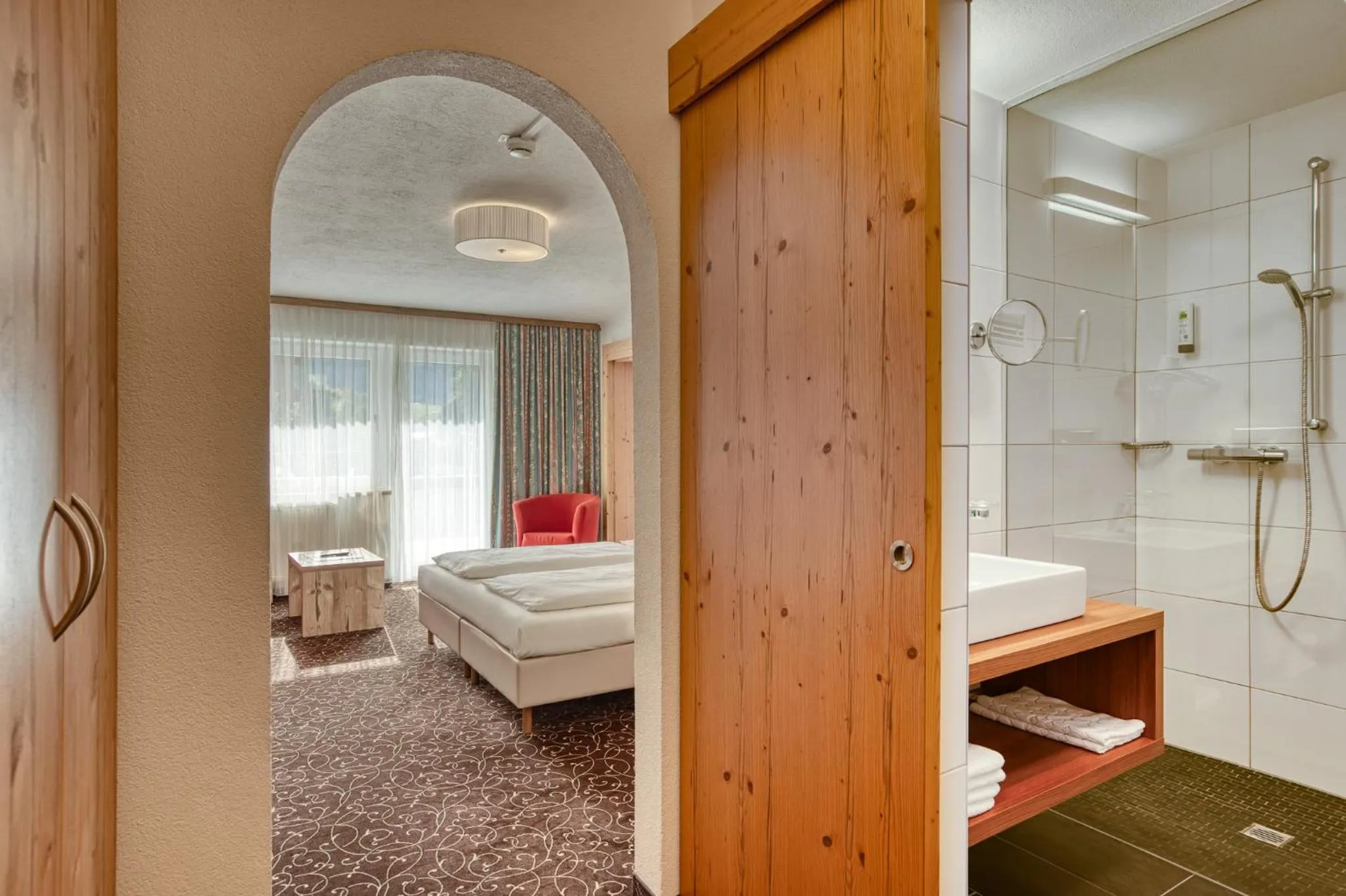 wardrobe, Bed in Hotel Erika