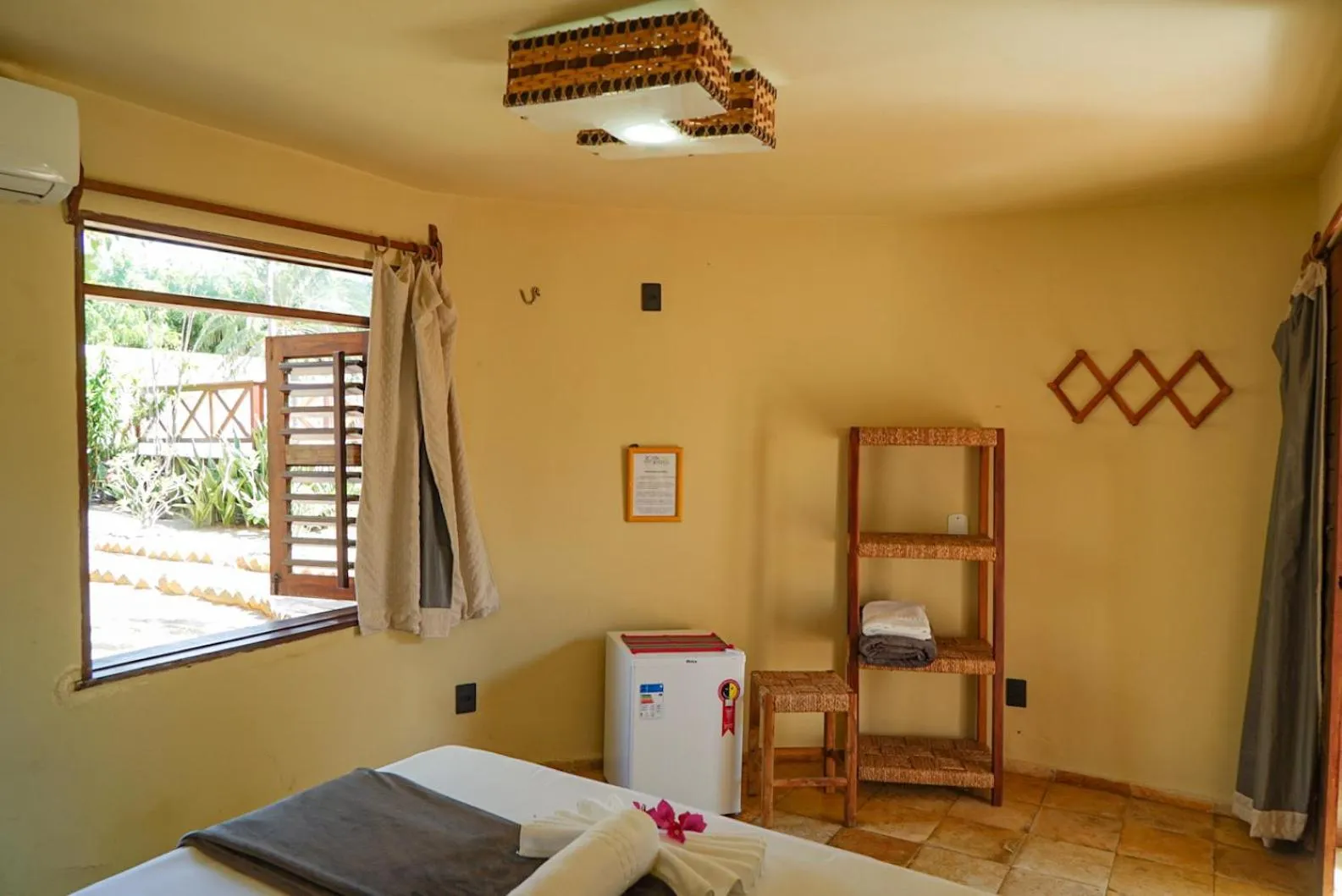 Bed in Pousada Rota dos Ventos