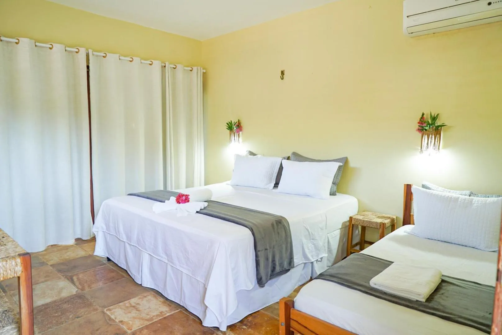 Bed in Pousada Rota dos Ventos