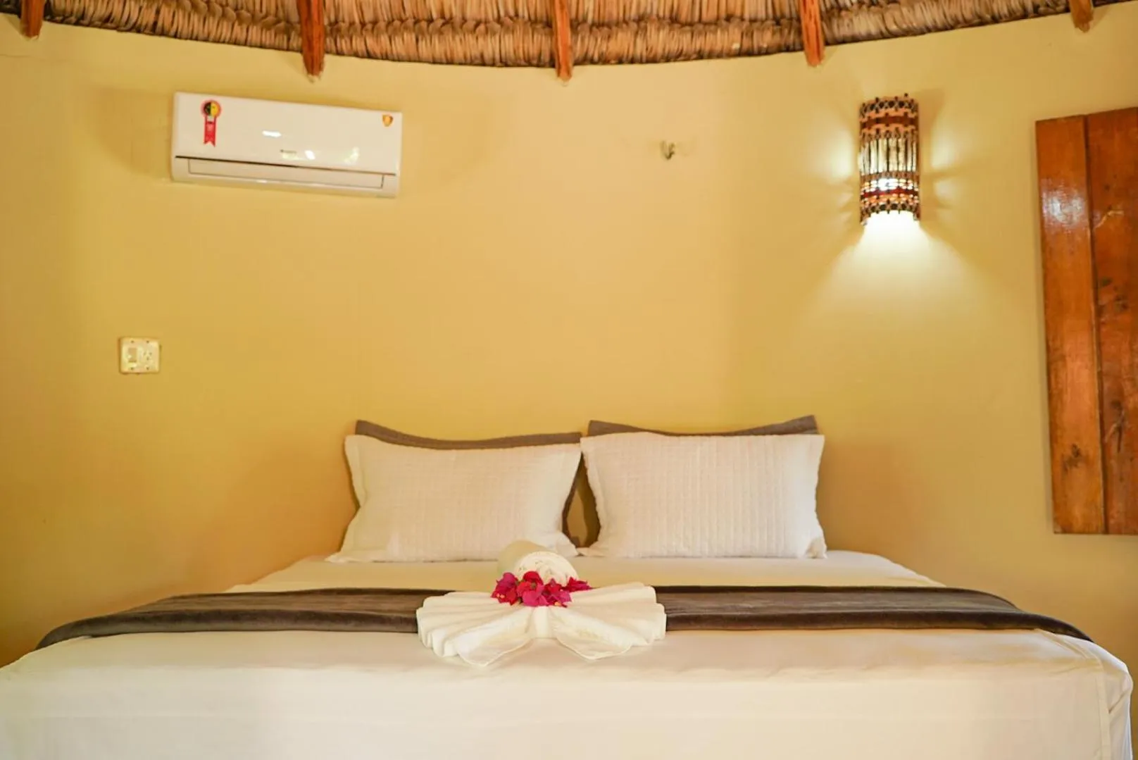 Bed in Pousada Rota dos Ventos