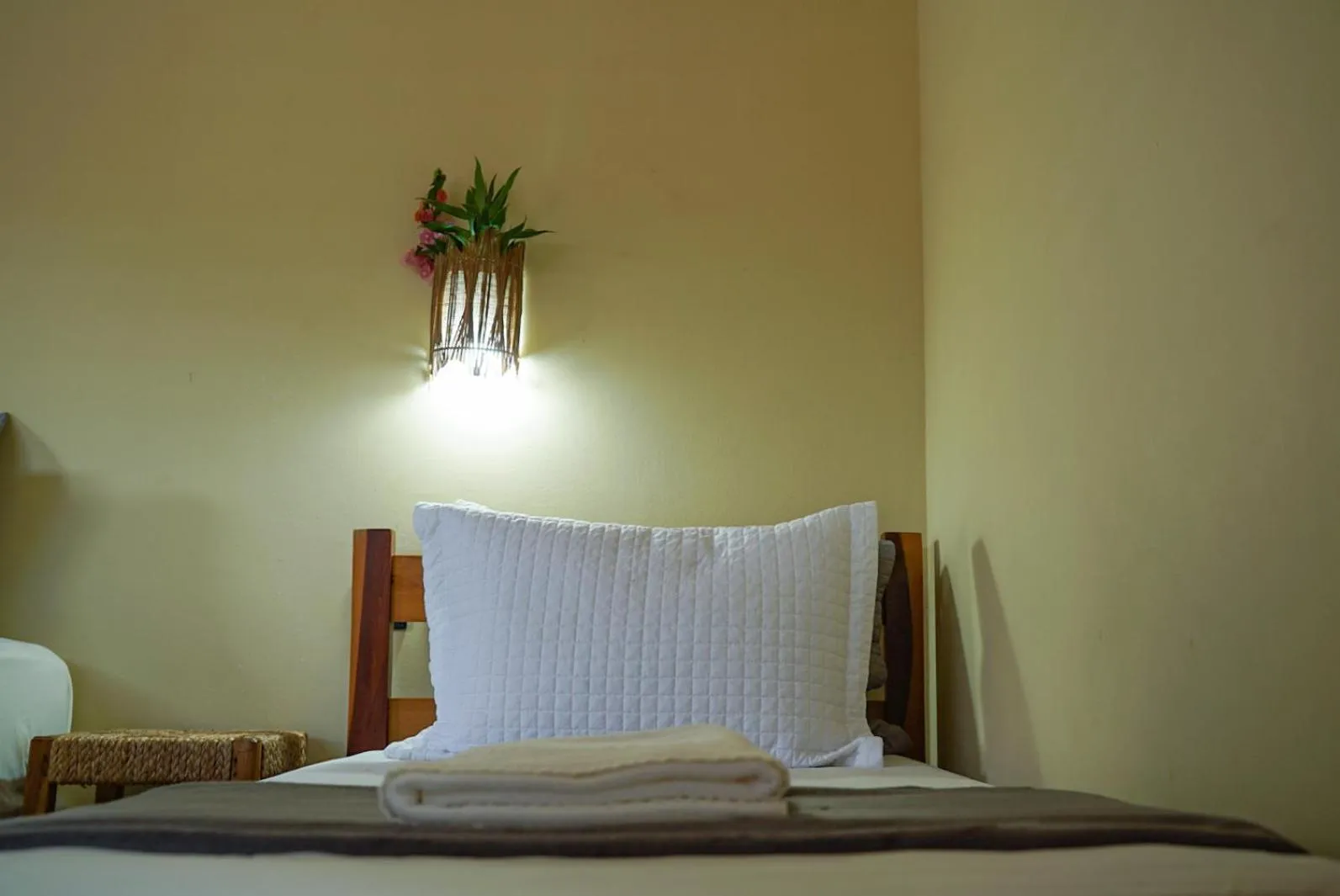 Bed in Pousada Rota dos Ventos