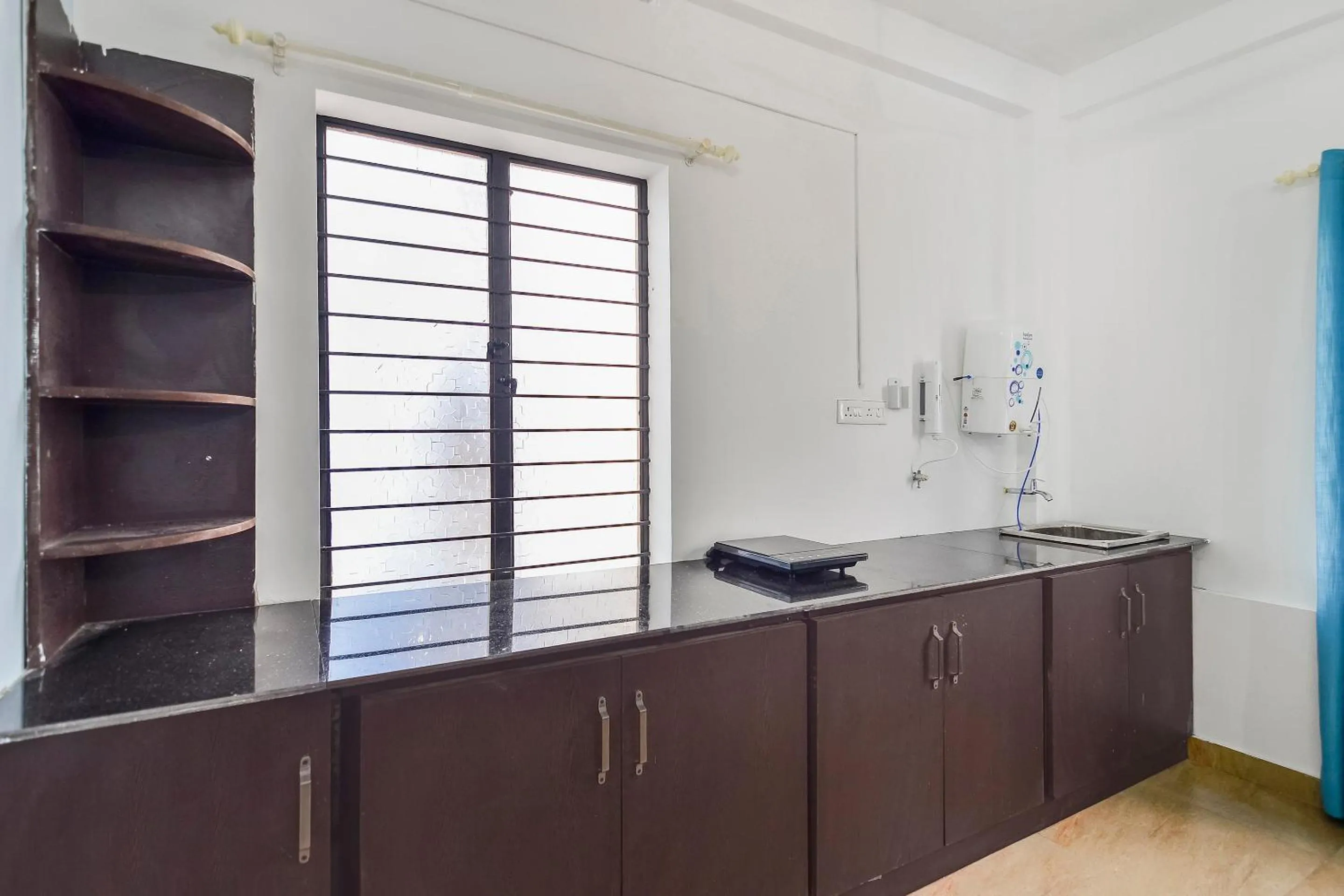 Kitchen or kitchenette in Hotel O Pop Tavern