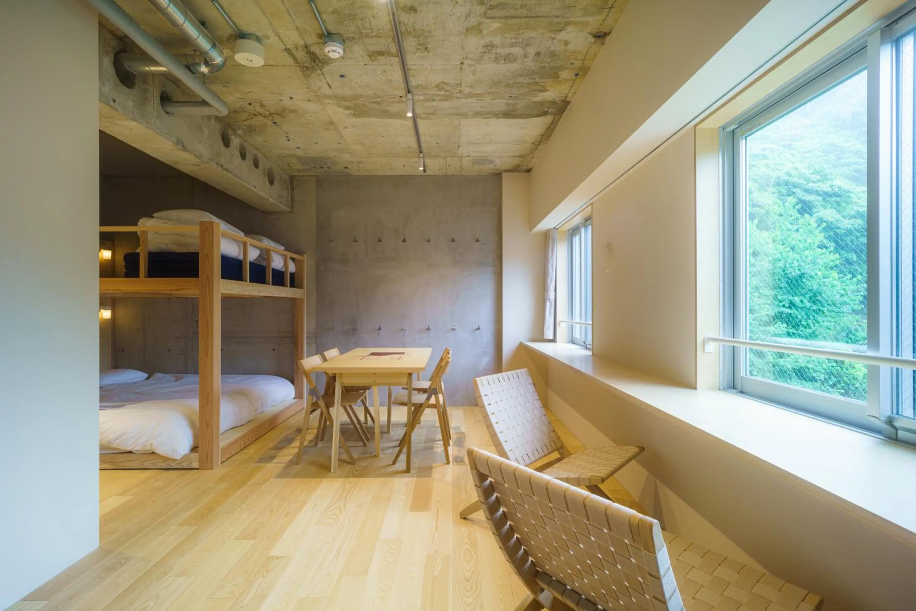 Bed in TAKAONE ACTIVITY＆STAY