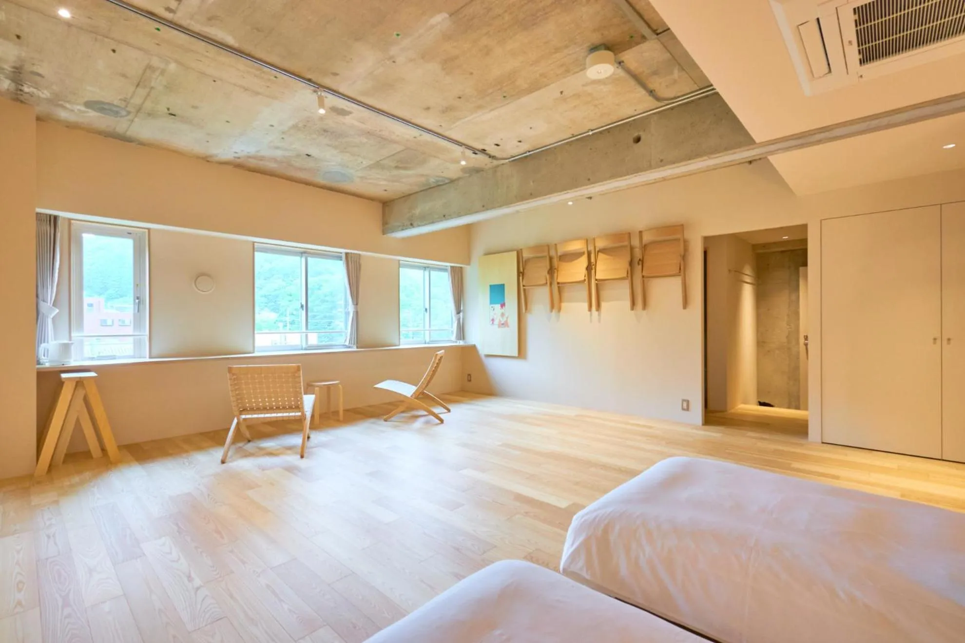 Bed in TAKAONE ACTIVITY＆STAY