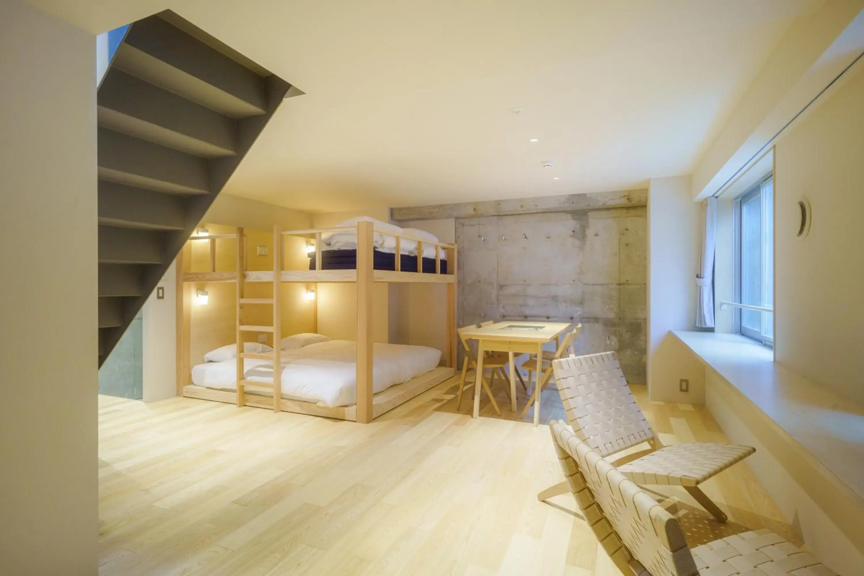 Bed in TAKAONE ACTIVITY&STAY Bed in TAKAONE ACTIVITY&STAY