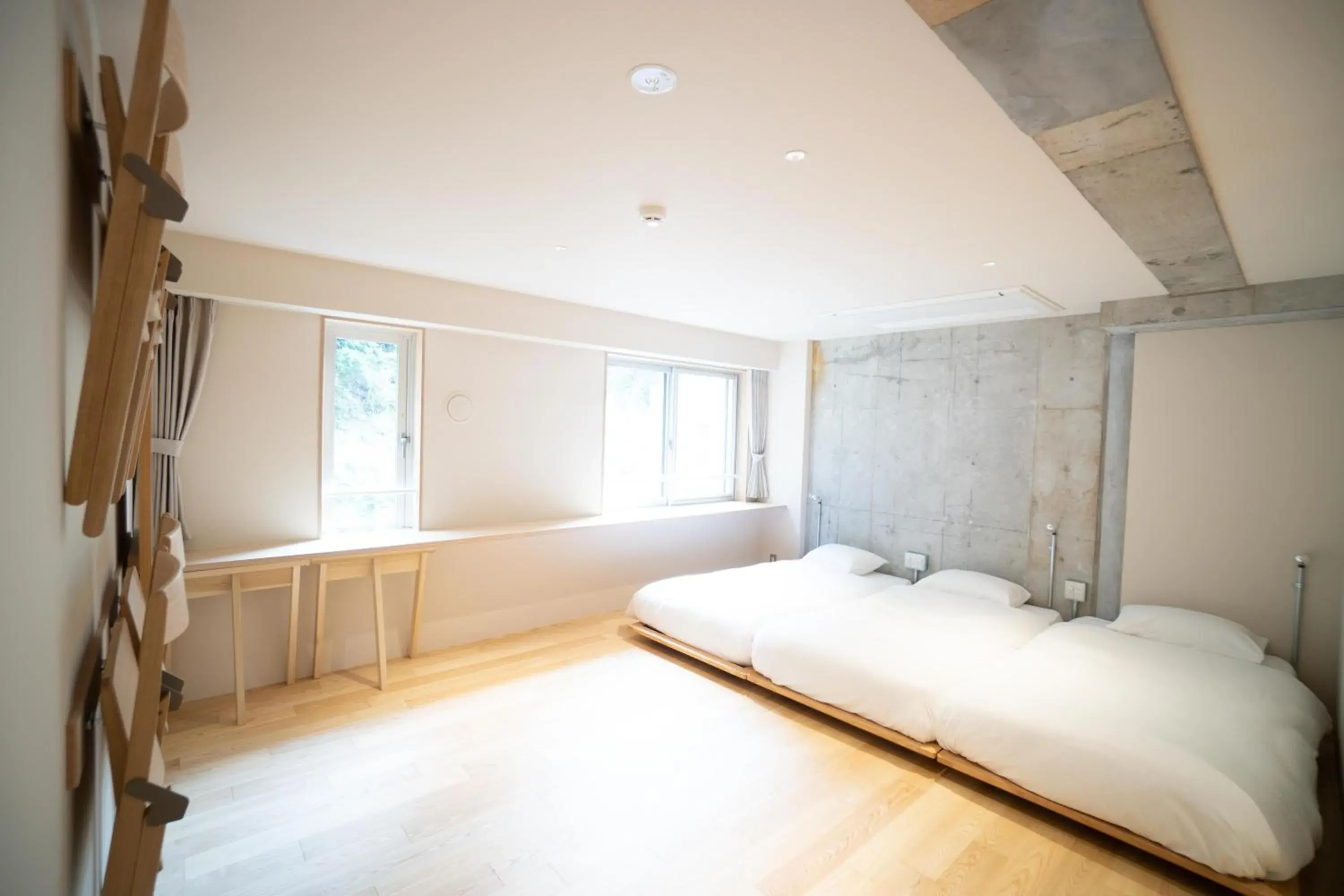 Bed in TAKAONE ACTIVITY&STAY Bed in TAKAONE ACTIVITY&STAY