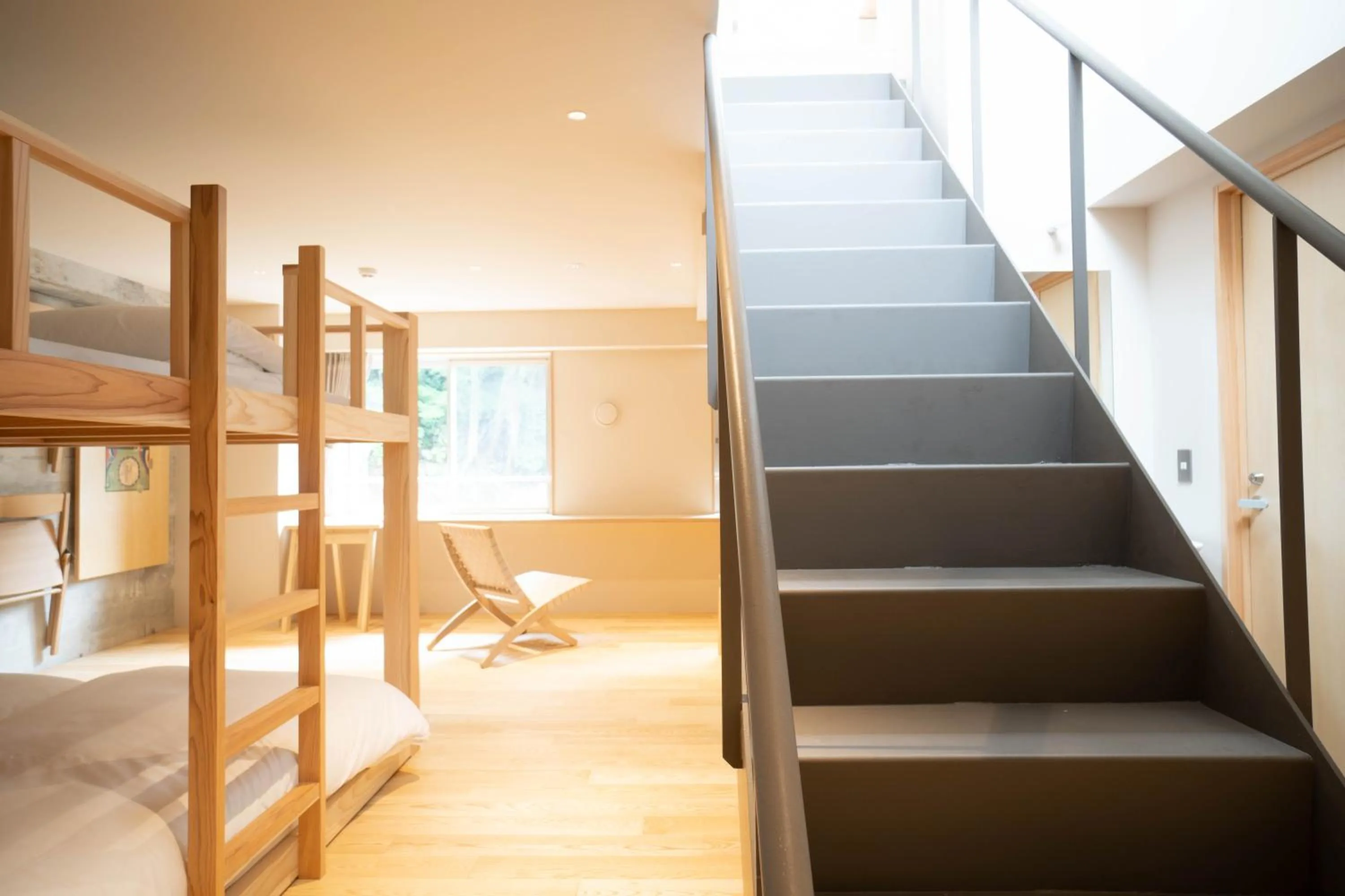 Bed in TAKAONE ACTIVITY＆STAY