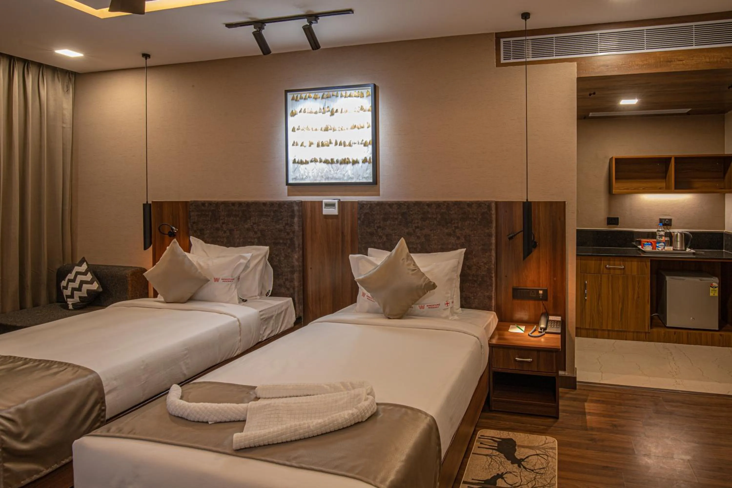 Bed in Windstone Residency