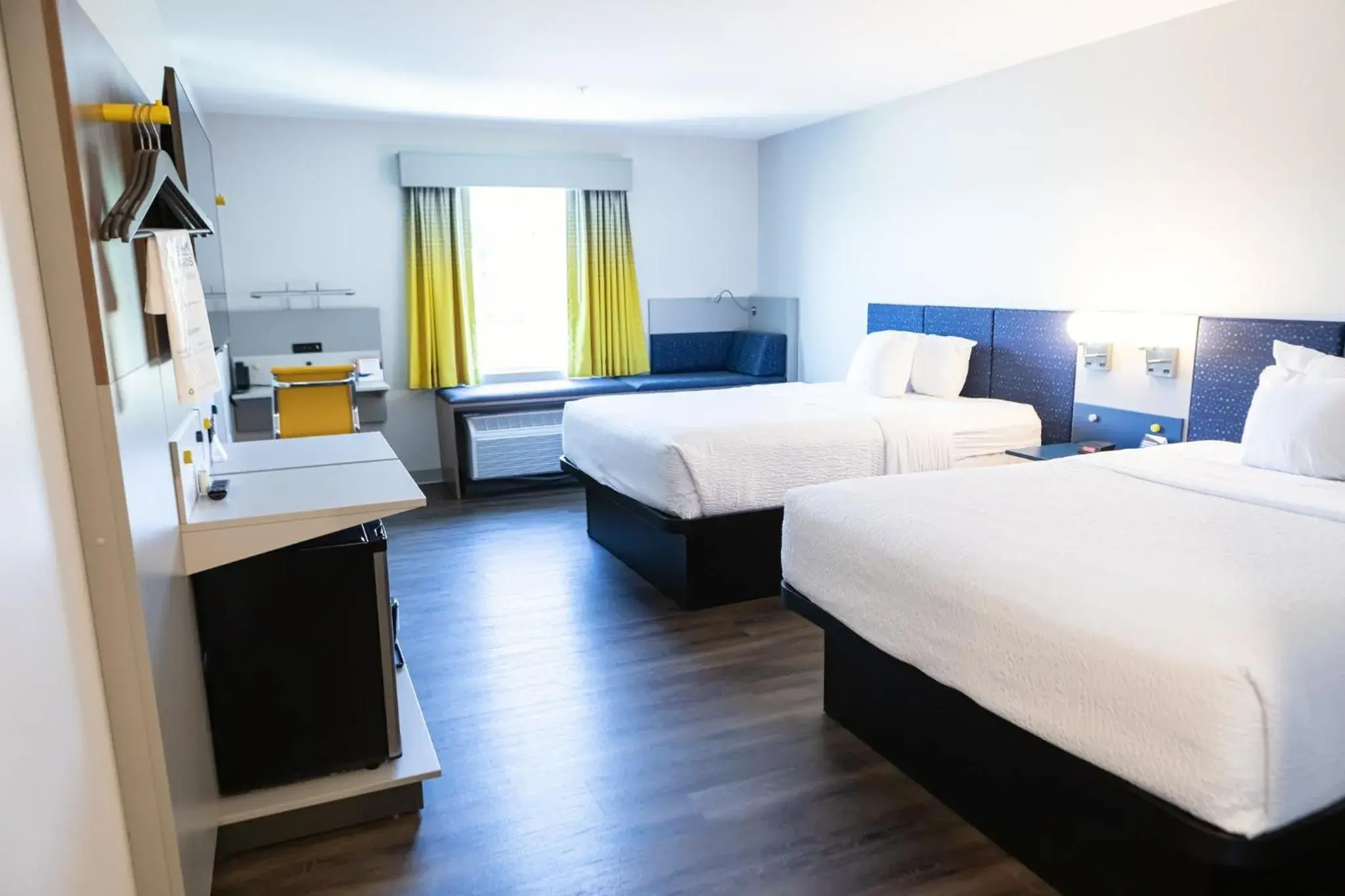 Bed in Microtel Inn & Suites by Wyndham Milford Bed in Microtel Inn & Suites by Wyndham Milford