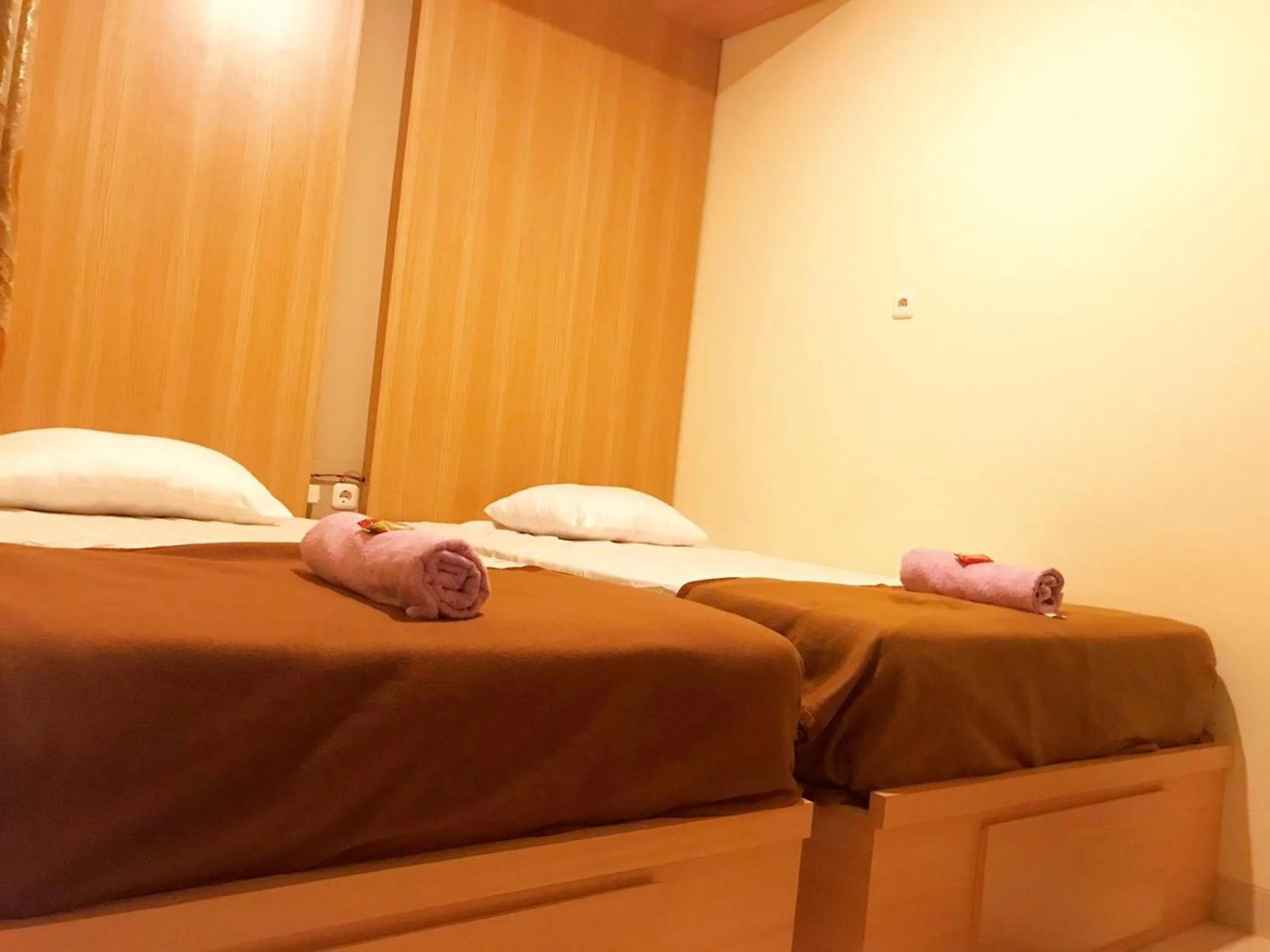 Bed in Kangen Yogya Homestay Malioboro Mitra RedDoorz