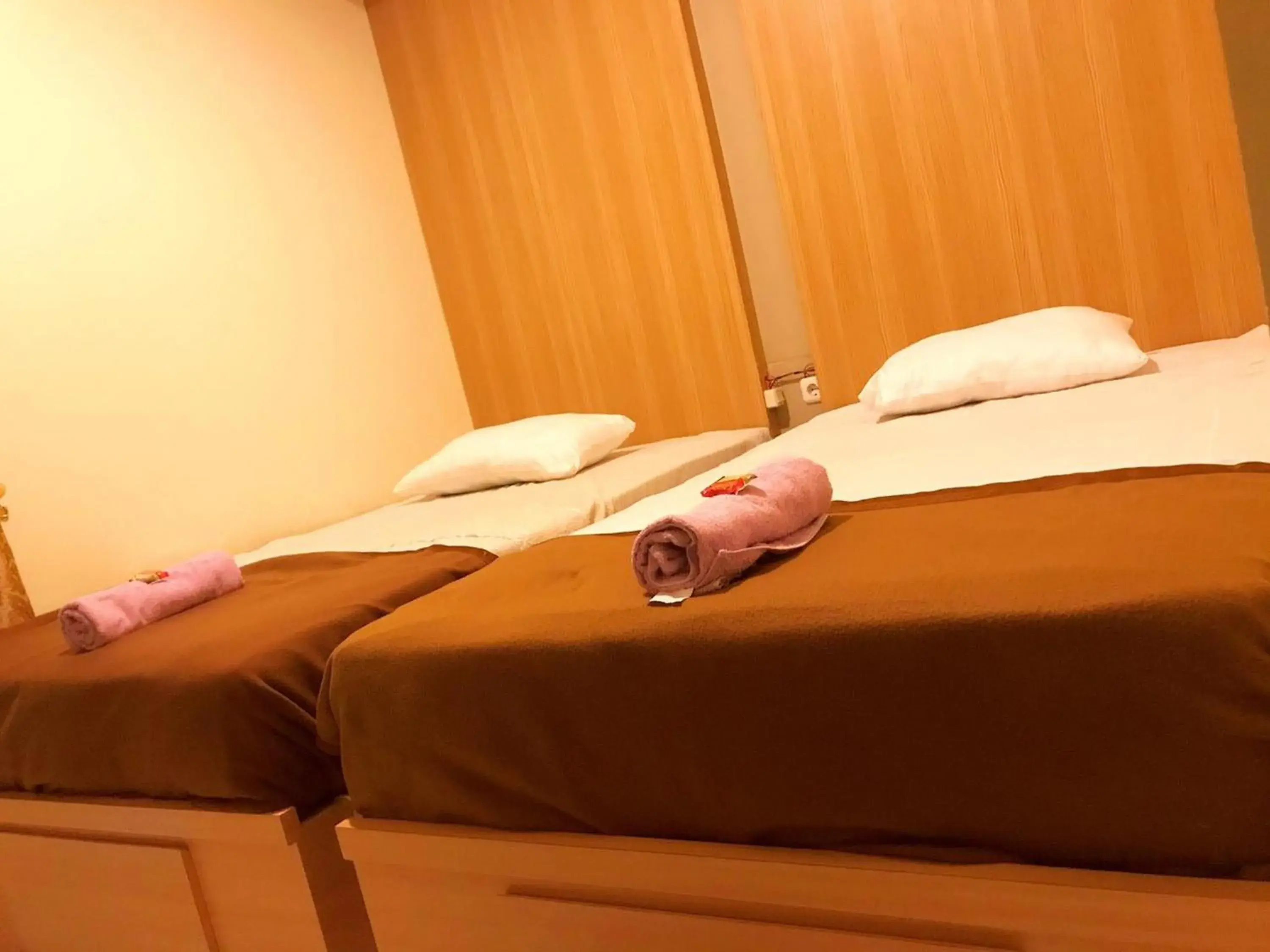 Bed in Kangen Yogya Homestay Malioboro Mitra RedDoorz Bed in Kangen Yogya Homestay Malioboro Mitra RedDoorz