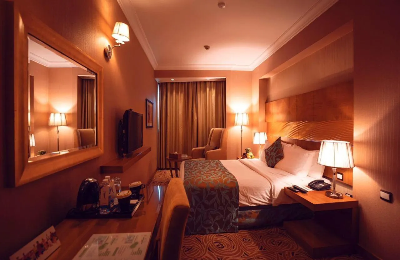 Bed in Coral Baghdad Hotel