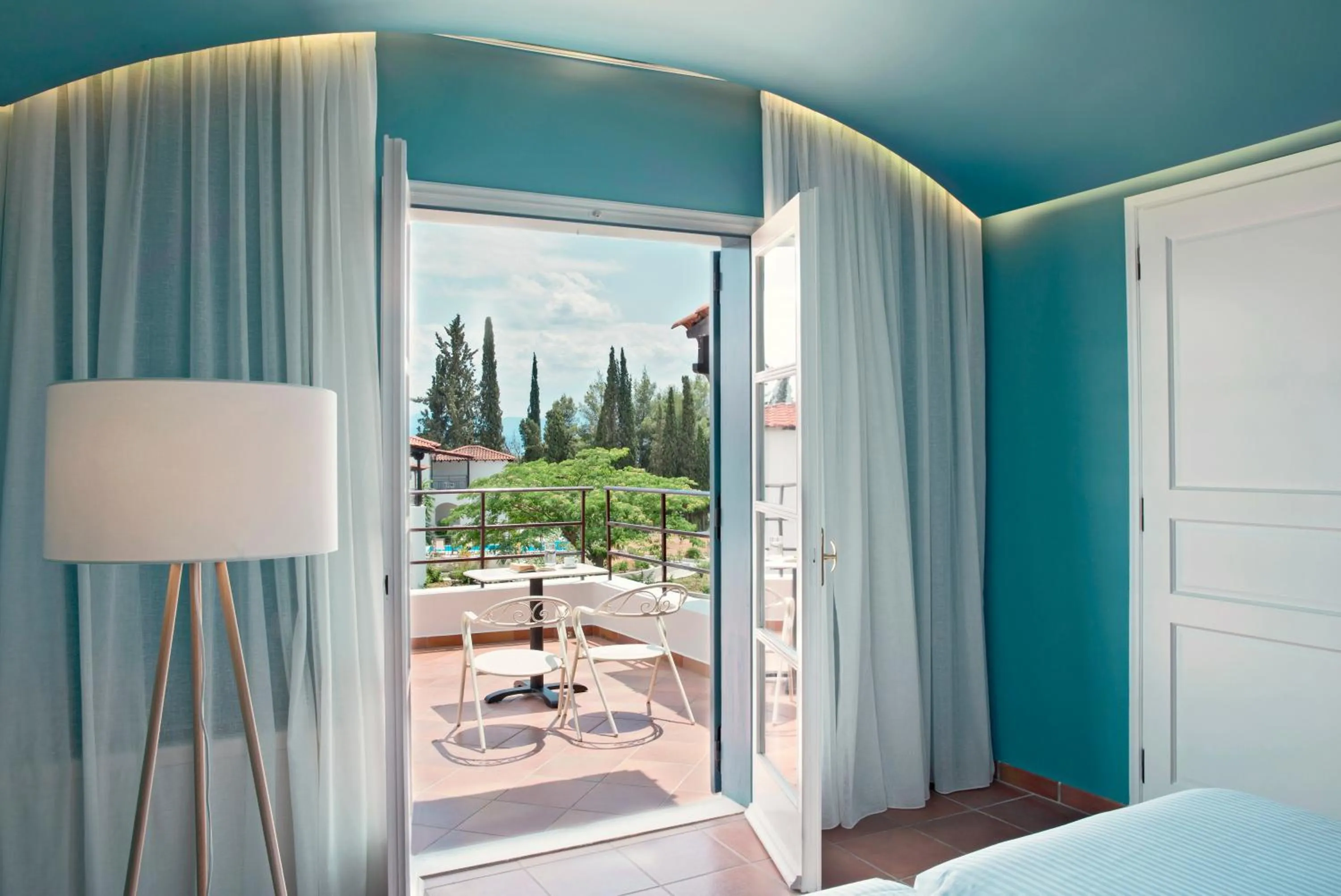 Balcony/Terrace, Bed in Zeus Eretria Resort