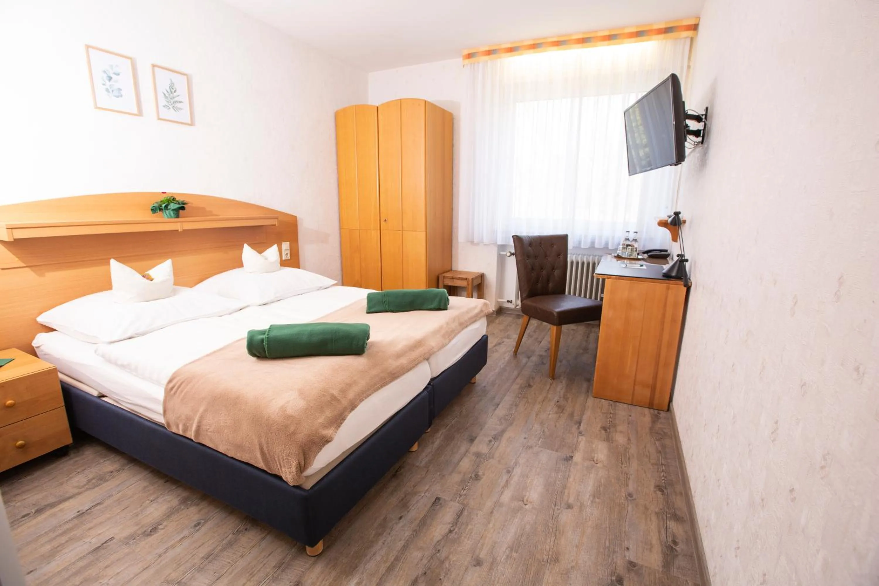 Bed in Hotel-Pension Haus Holtdirk