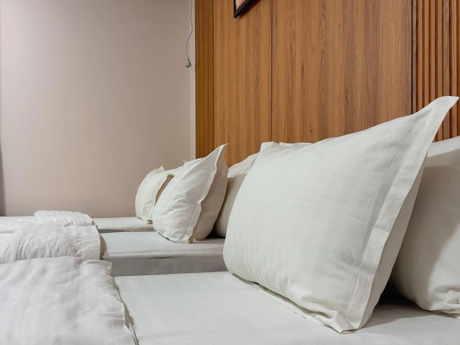 Bed in Musafir Hotel