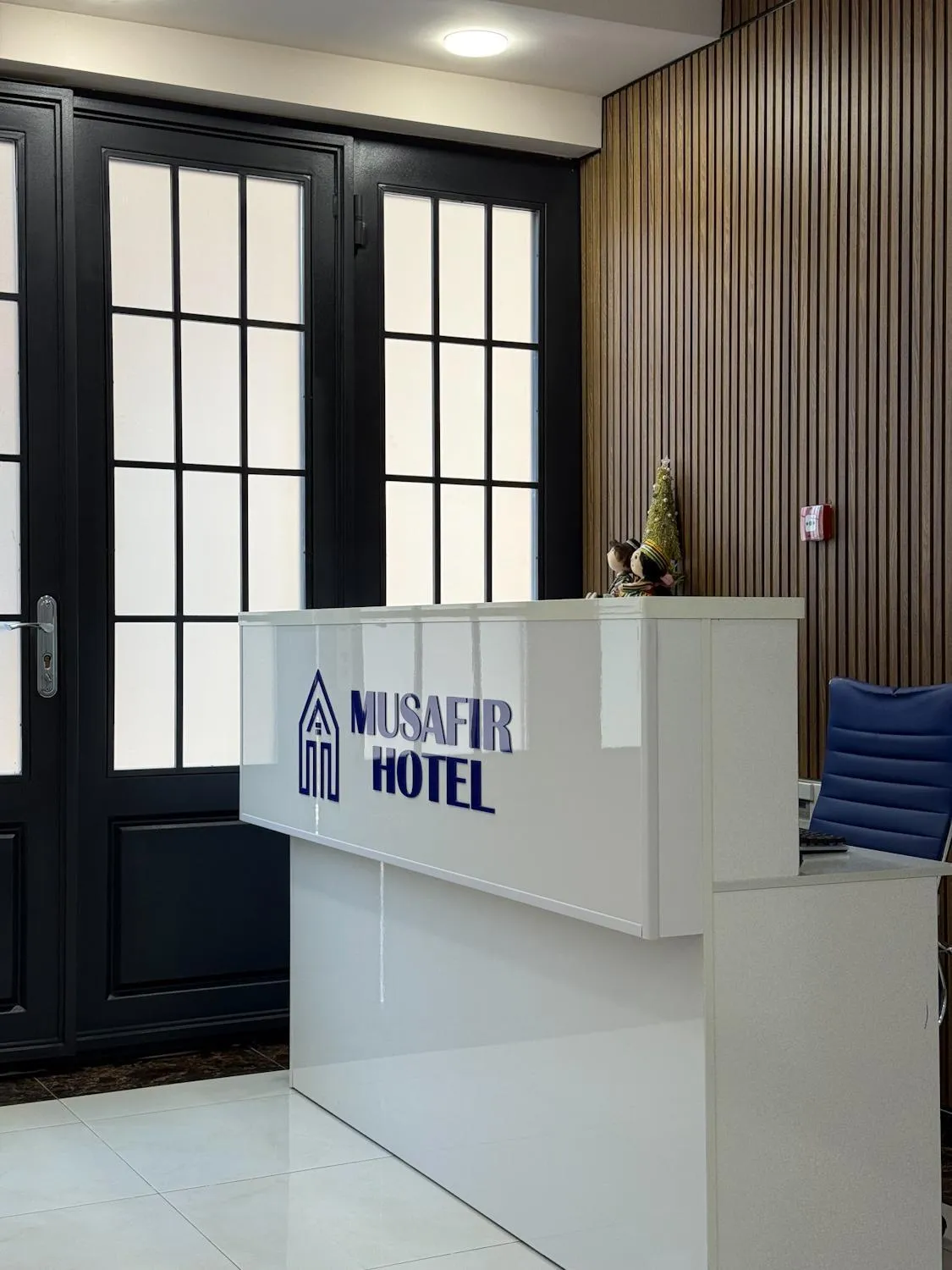 Property logo or sign in Musafir Hotel