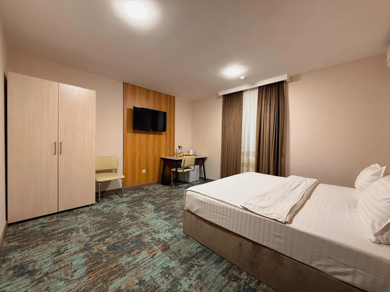 Bed in Musafir Hotel