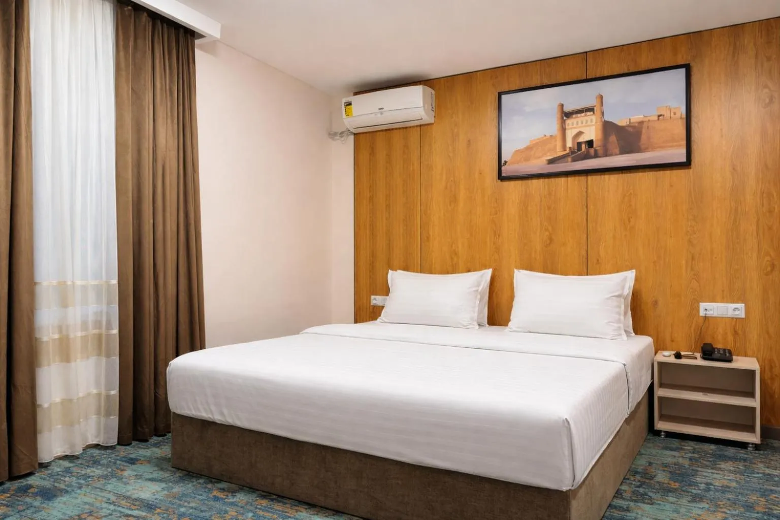 Bed in Musafir Hotel