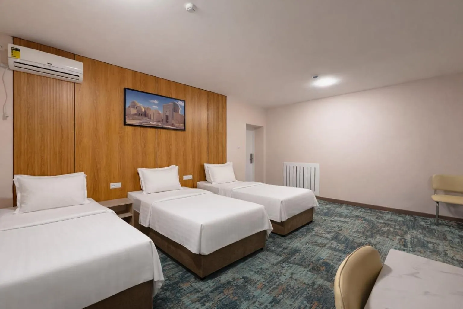 Bed in Musafir Hotel