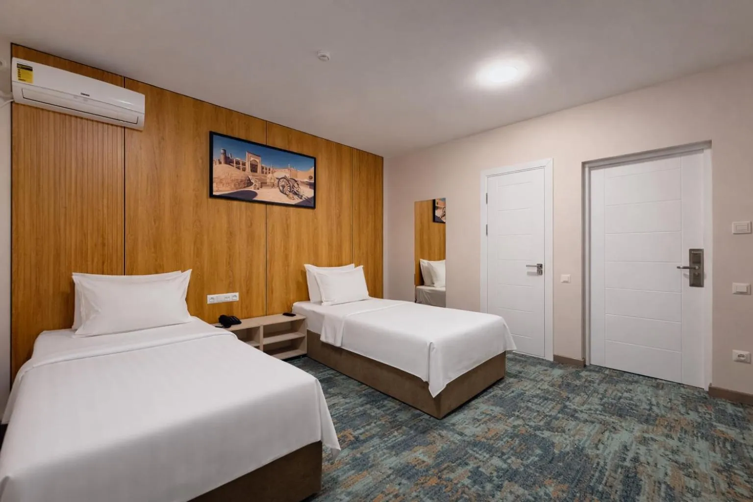 Bed in Musafir Hotel