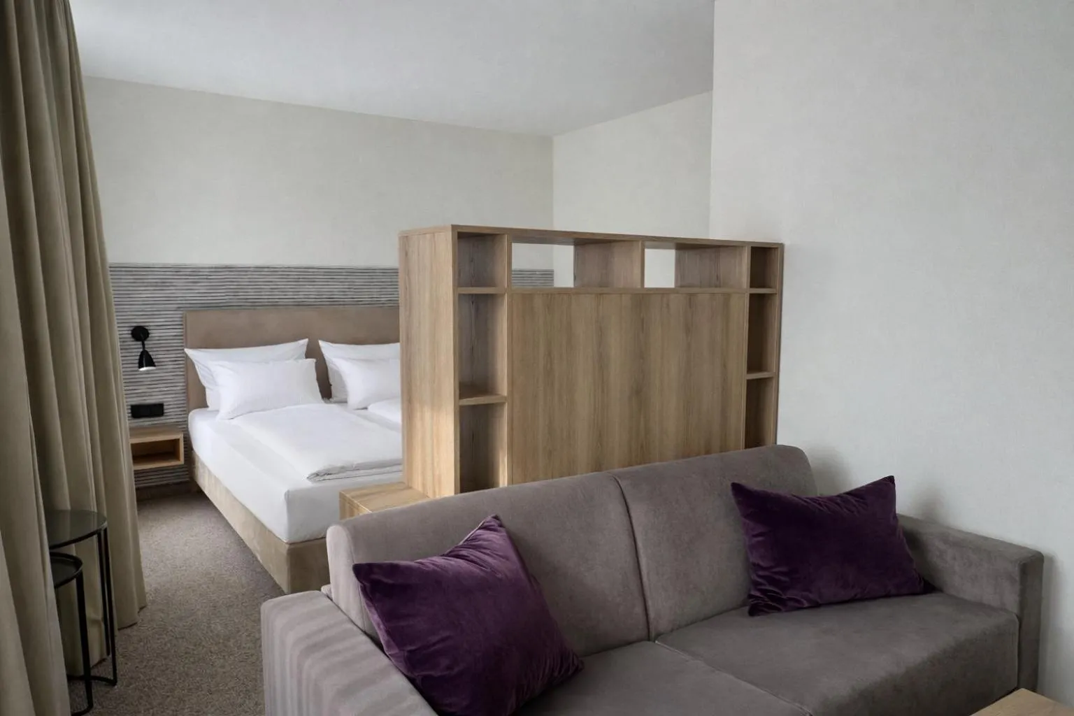 Photo of the whole room, Bed in DORMERO Aparthotel Stralsund