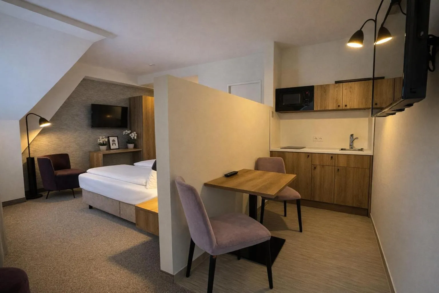 Photo of the whole room, Bed in DORMERO Aparthotel Stralsund