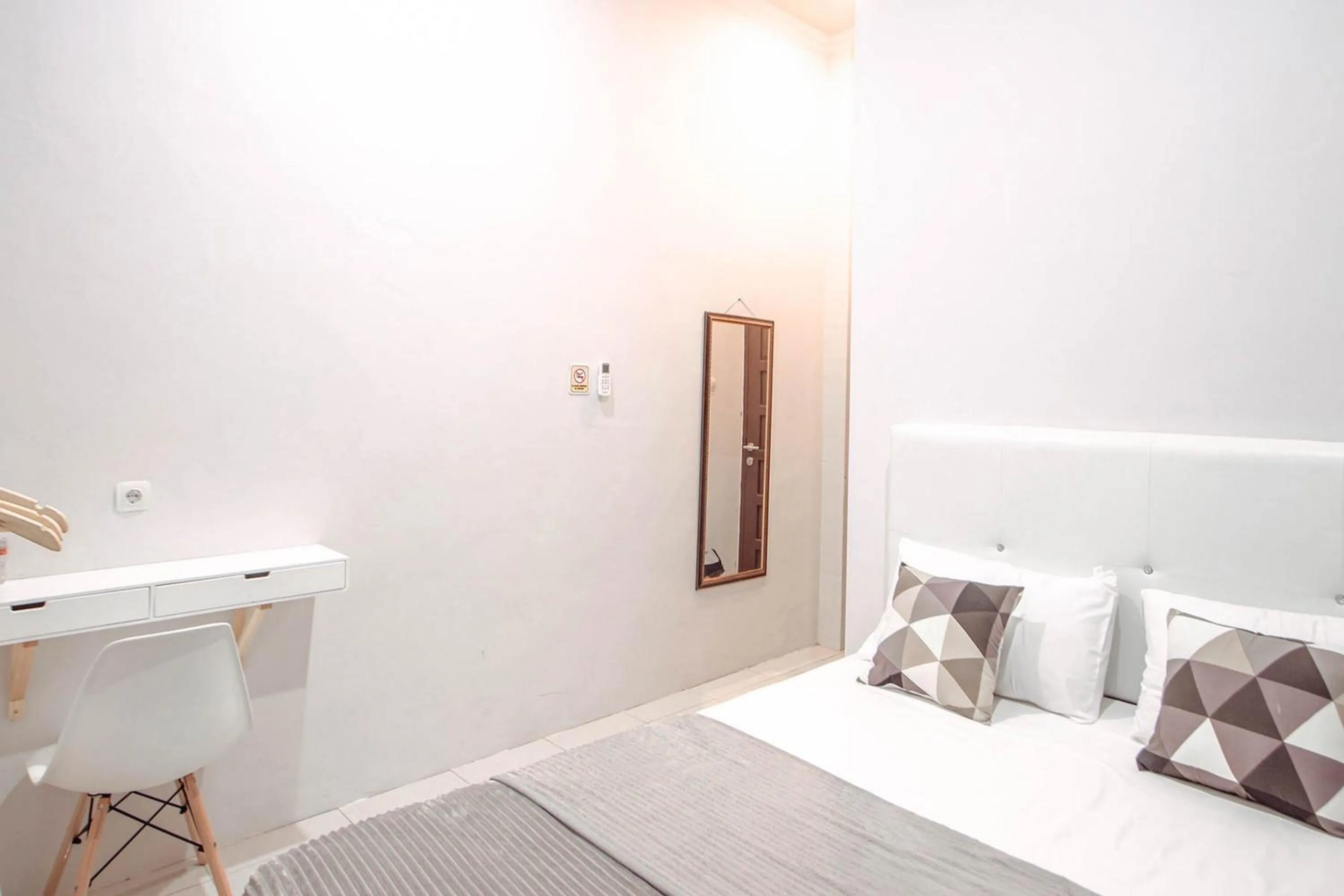 Bed in Krisan Guest House Syariah Banjarbaru Mitra RedDoorz