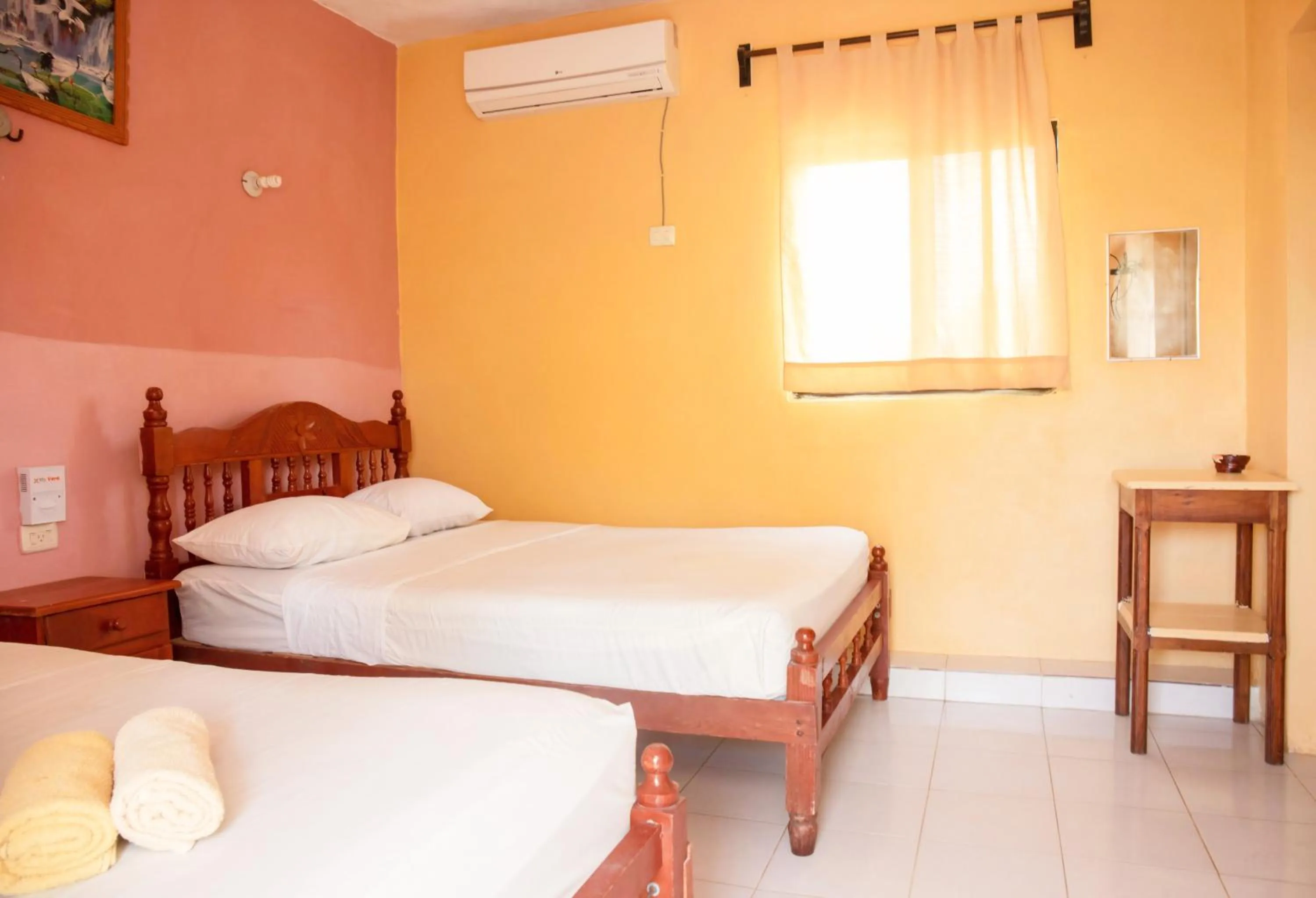 Bed in Hotel Los Arcos Holbox