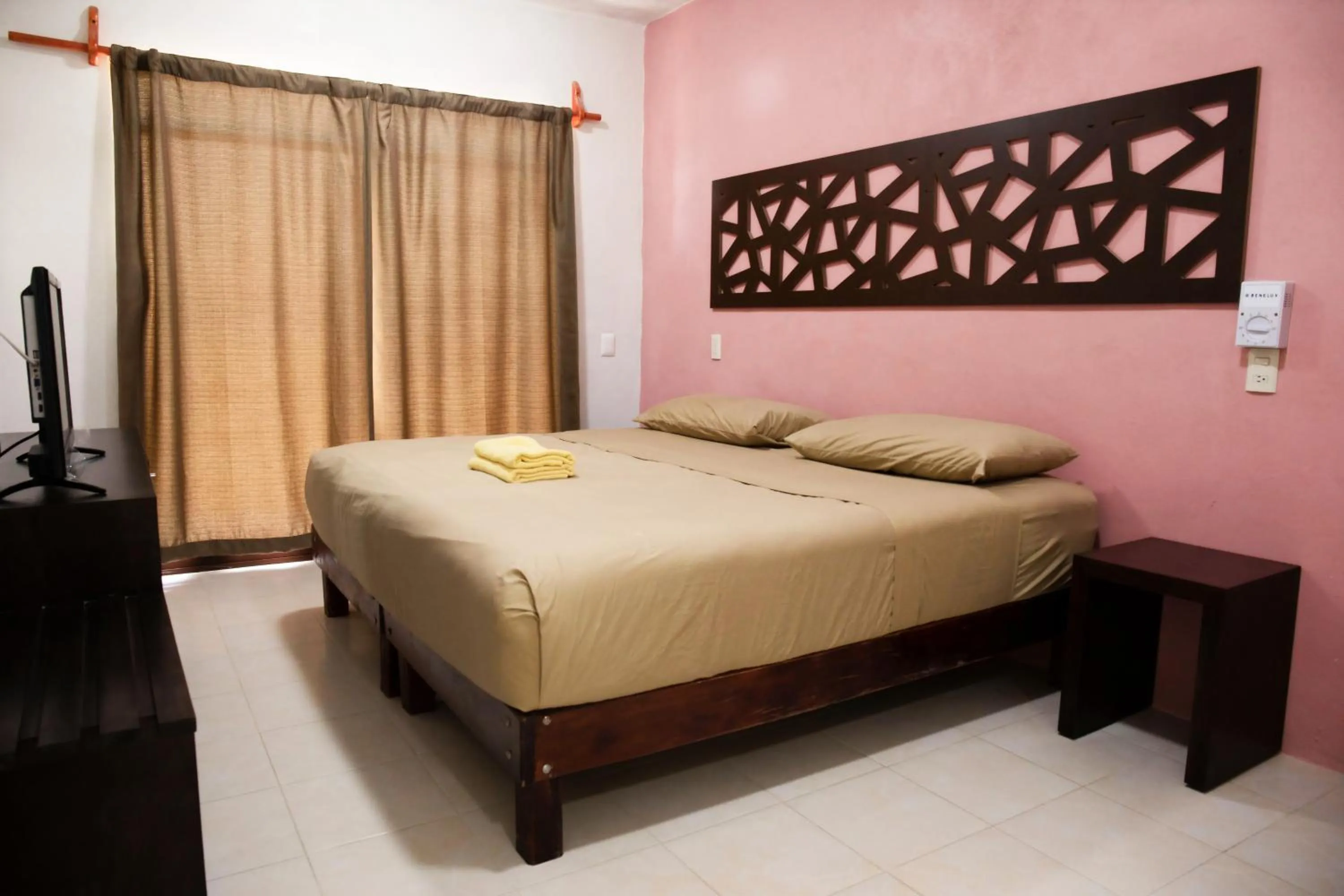Bed in Hotel Los Arcos Holbox