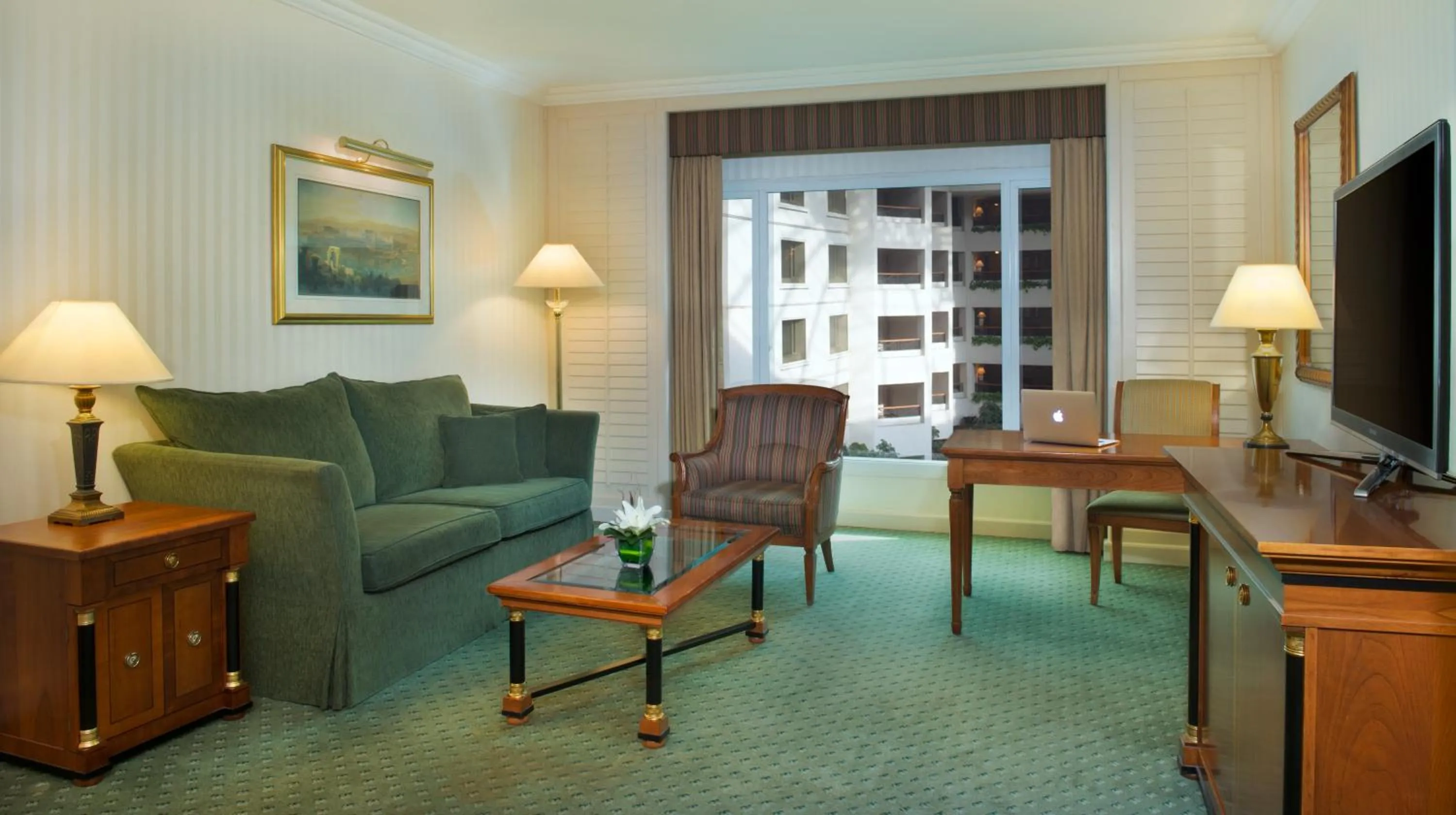 Living room in The Bristol Hotel by Royal Orchid Hotel Management