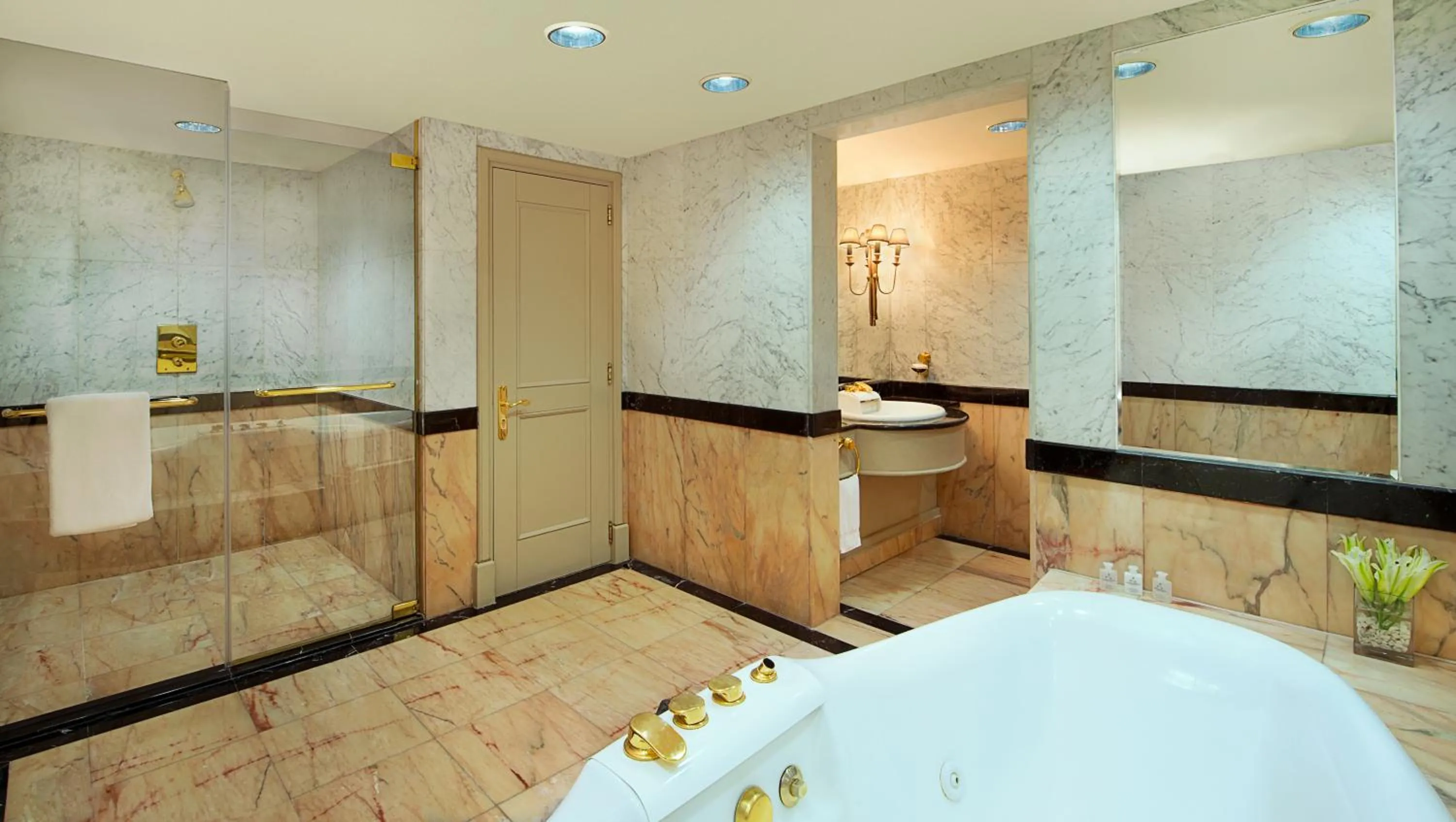 Bathroom in The Bristol Hotel by Royal Orchid Hotel Management