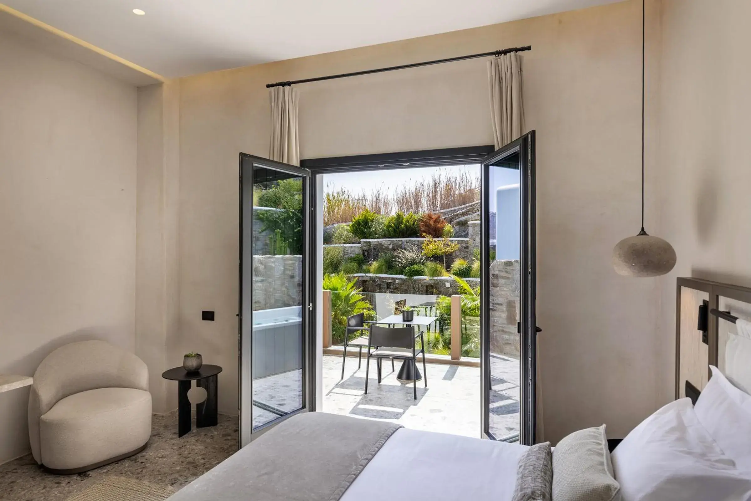 View (from property/room), Bed in Aeonic Suites and Spa View (from property/room), Bed in Aeonic Suites and Spa