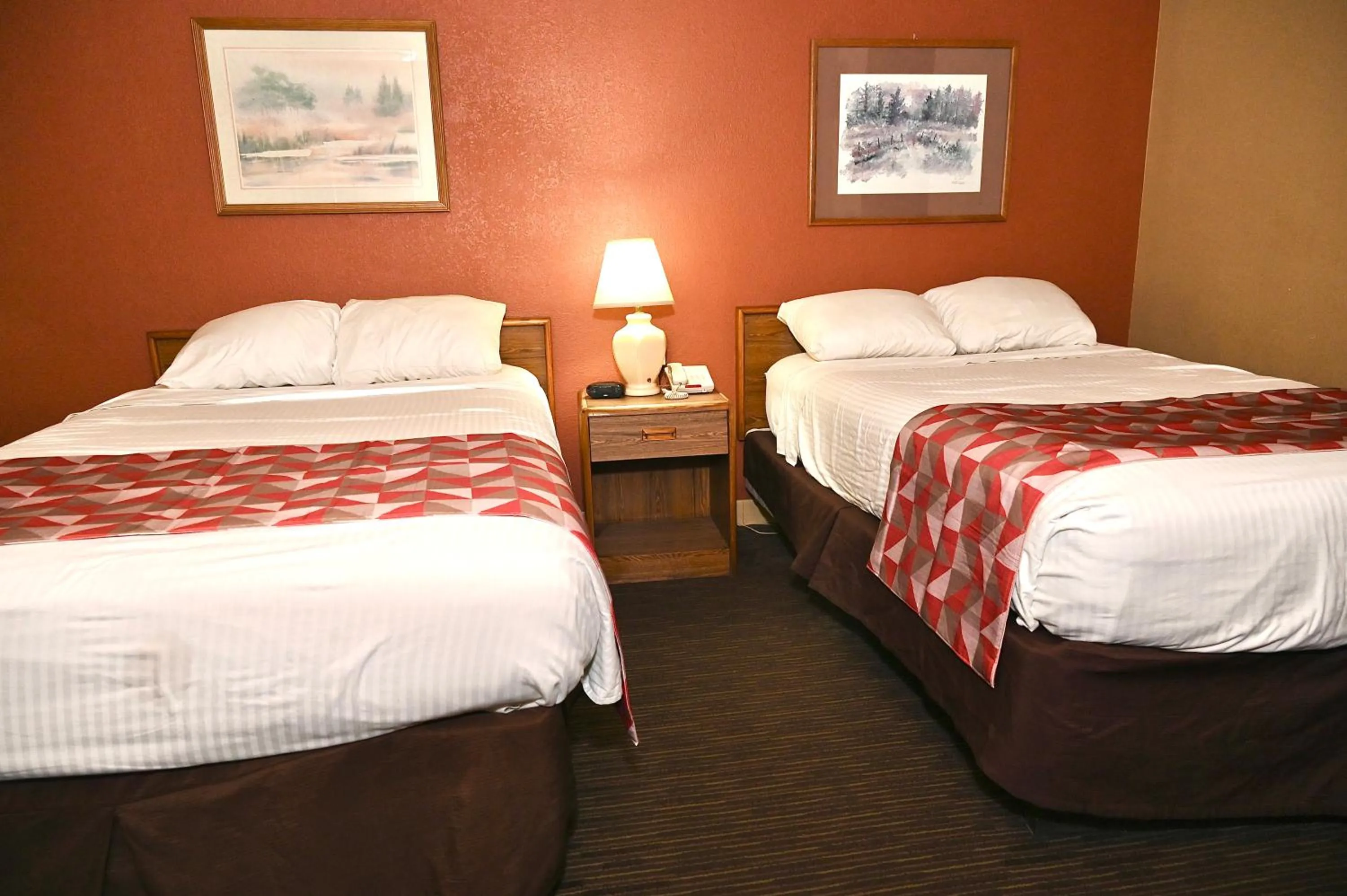 Bed in Fortune Inn & Suites