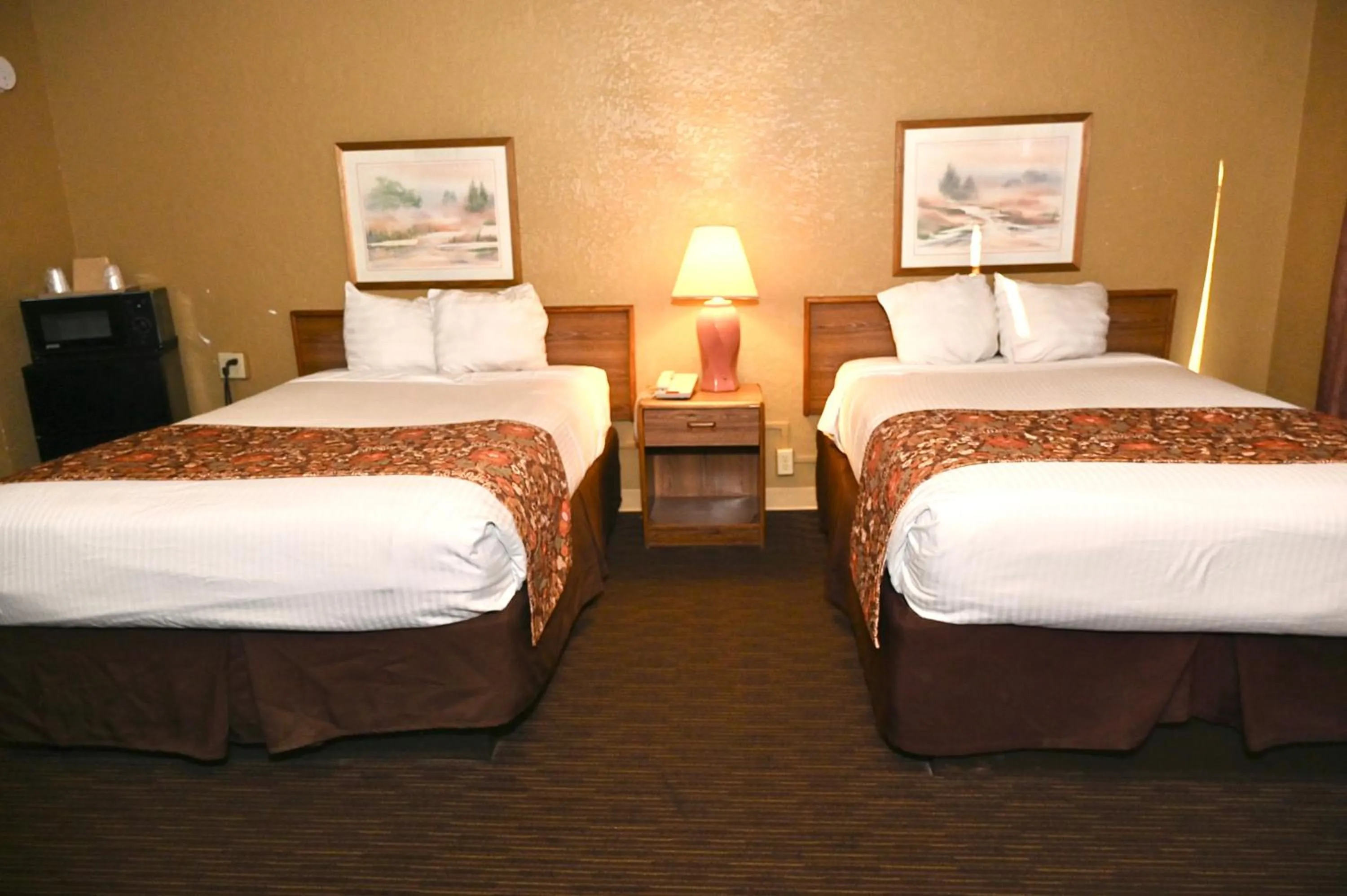 Bed in Fortune Inn & Suites