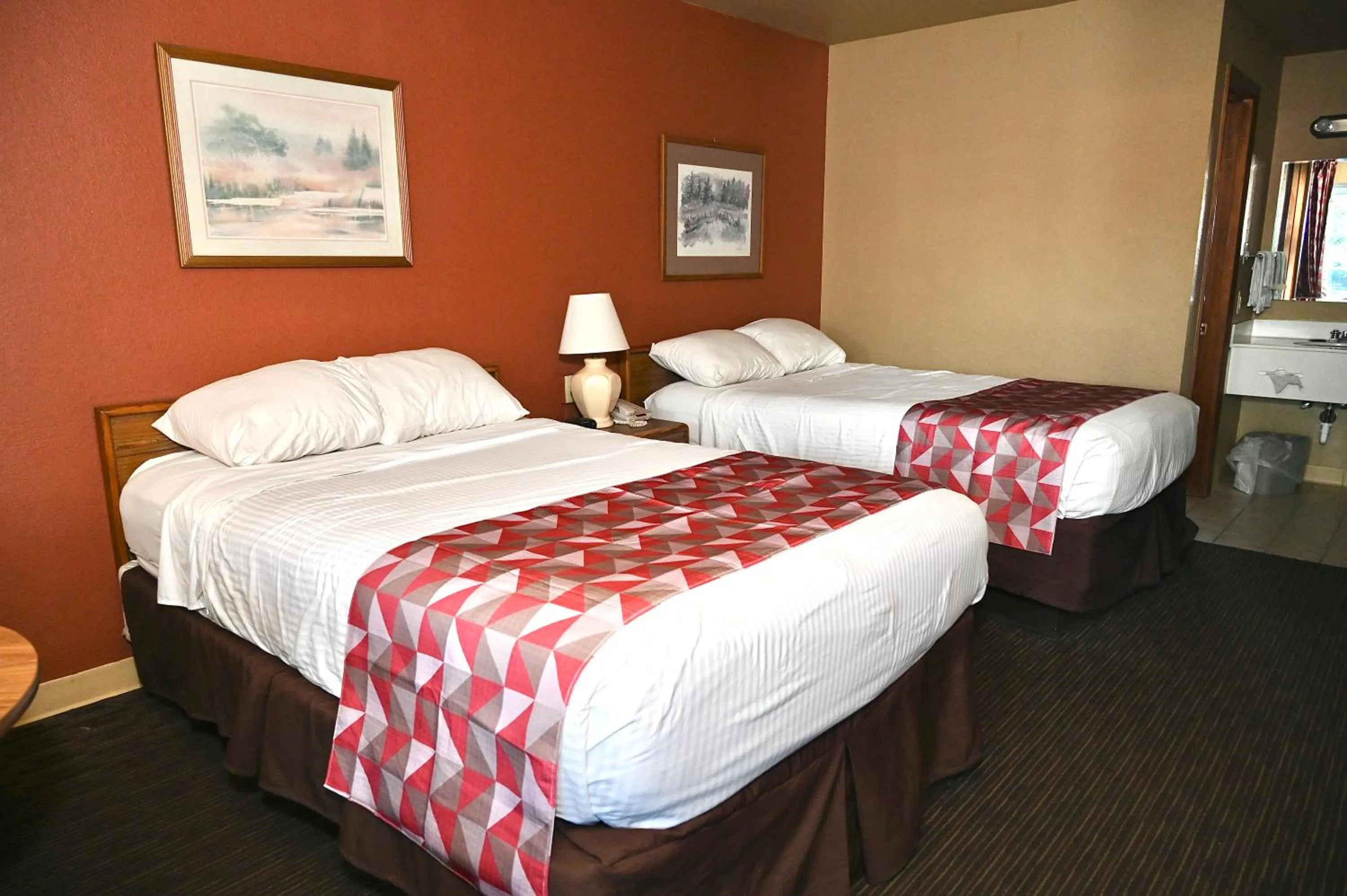Bed in Fortune Inn & Suites