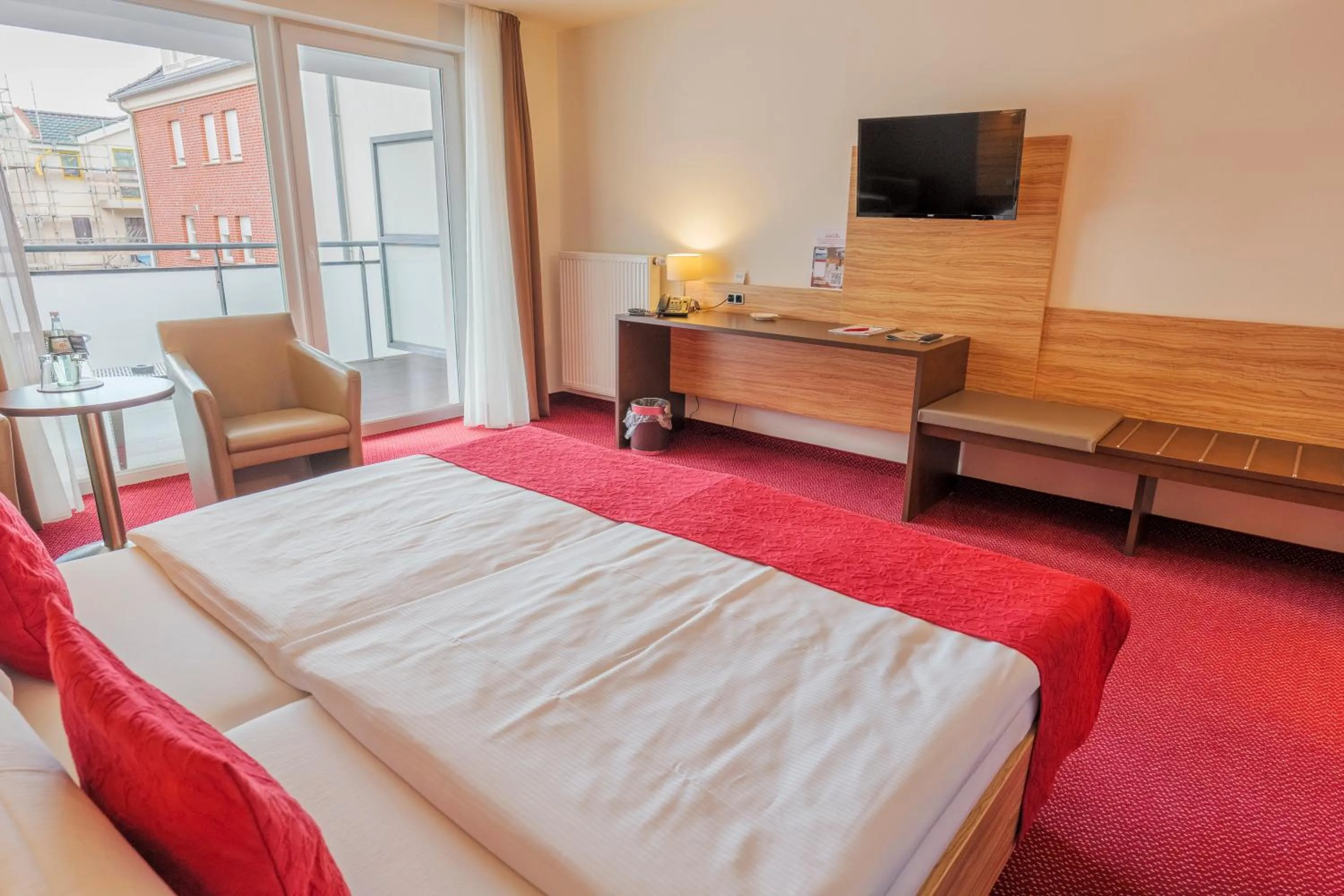 Photo of the whole room, Bed in Hotel Hafen Büsum