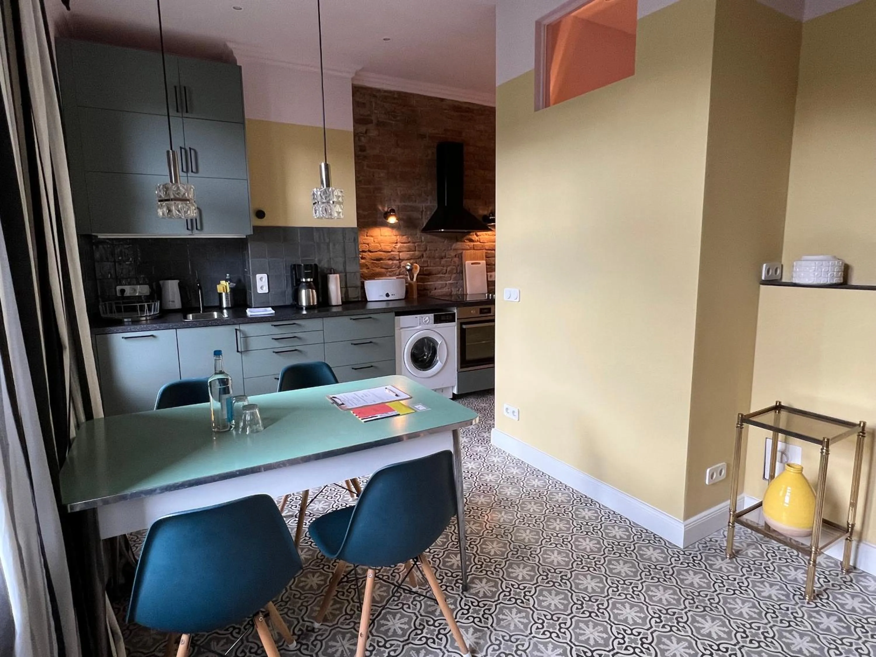 kitchen in Brilliant Apartments