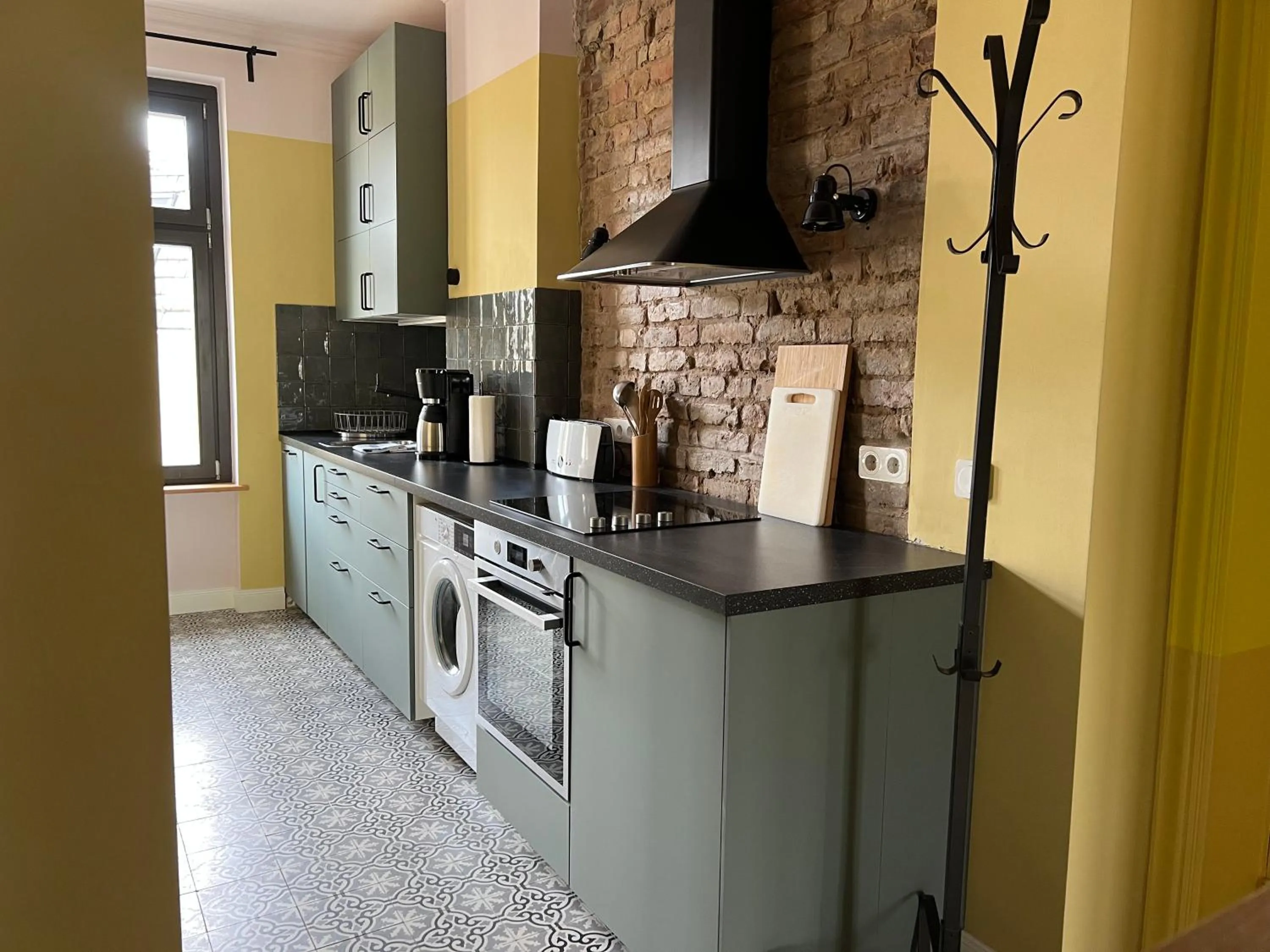 kitchen in Brilliant Apartments