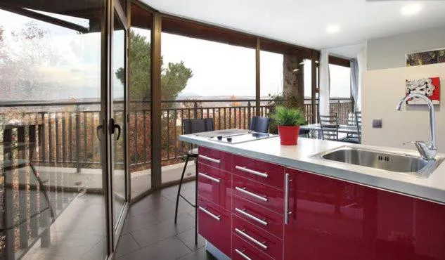 Kitchen or kitchenette in Les Suites