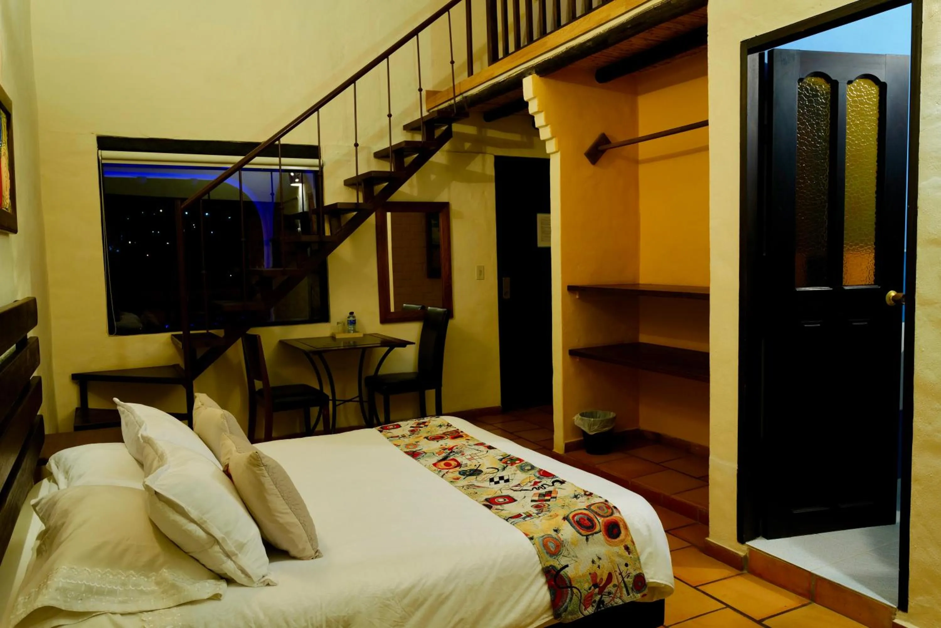 Text overlay, Bed in Bombon Hotel